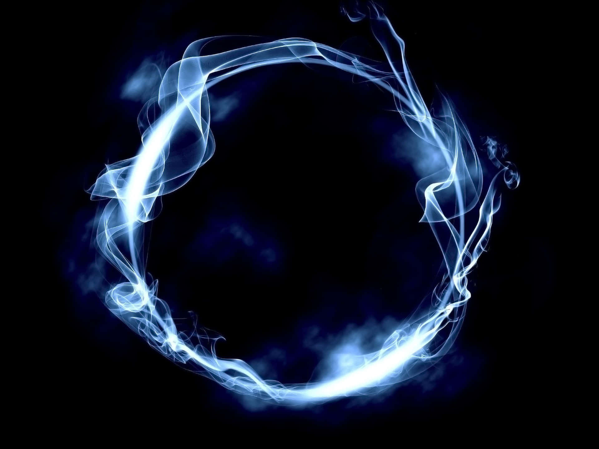 A beautiful abstract image of smoke in a mesmerizing blue hue. Wallpaper