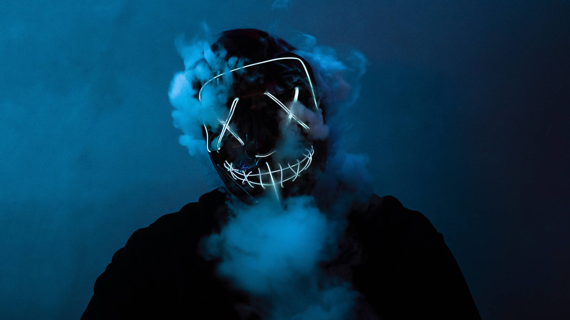 Unleash the Night with the Smoking Purge Mask Wallpaper