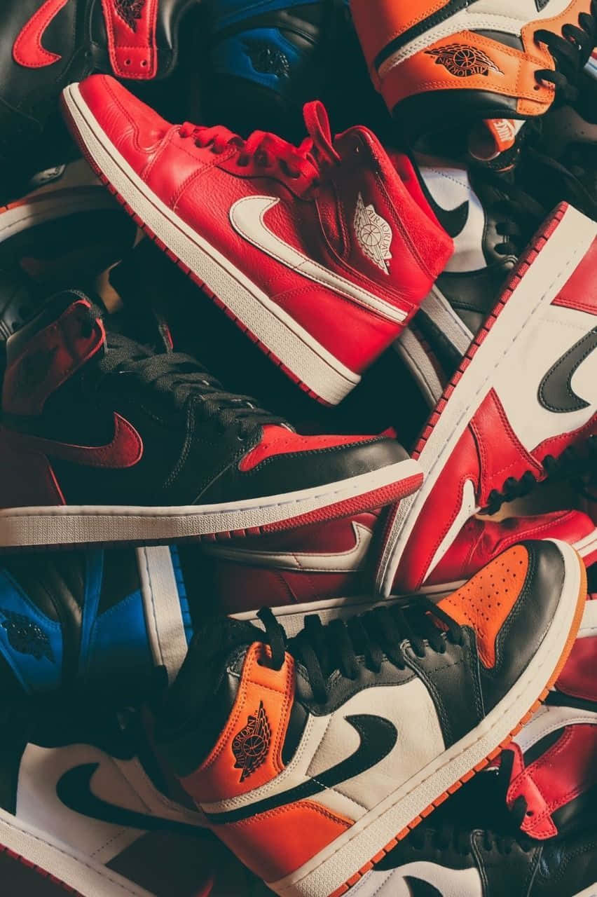 Take your pick from this colourful variety of stylish sneakers Wallpaper