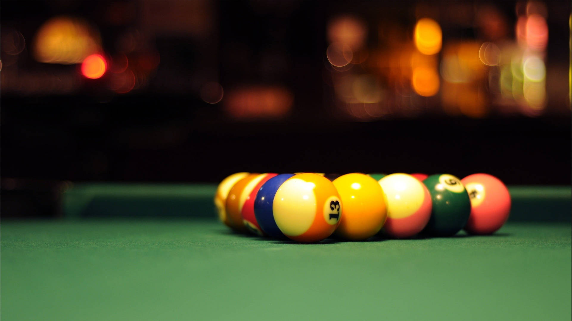 Caption: Perfect Lineup - Precision in Putting Snooker Balls Wallpaper