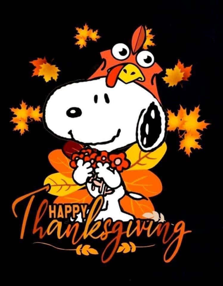 Snoopy celebrating Thanksgiving with a Fall feast Wallpaper