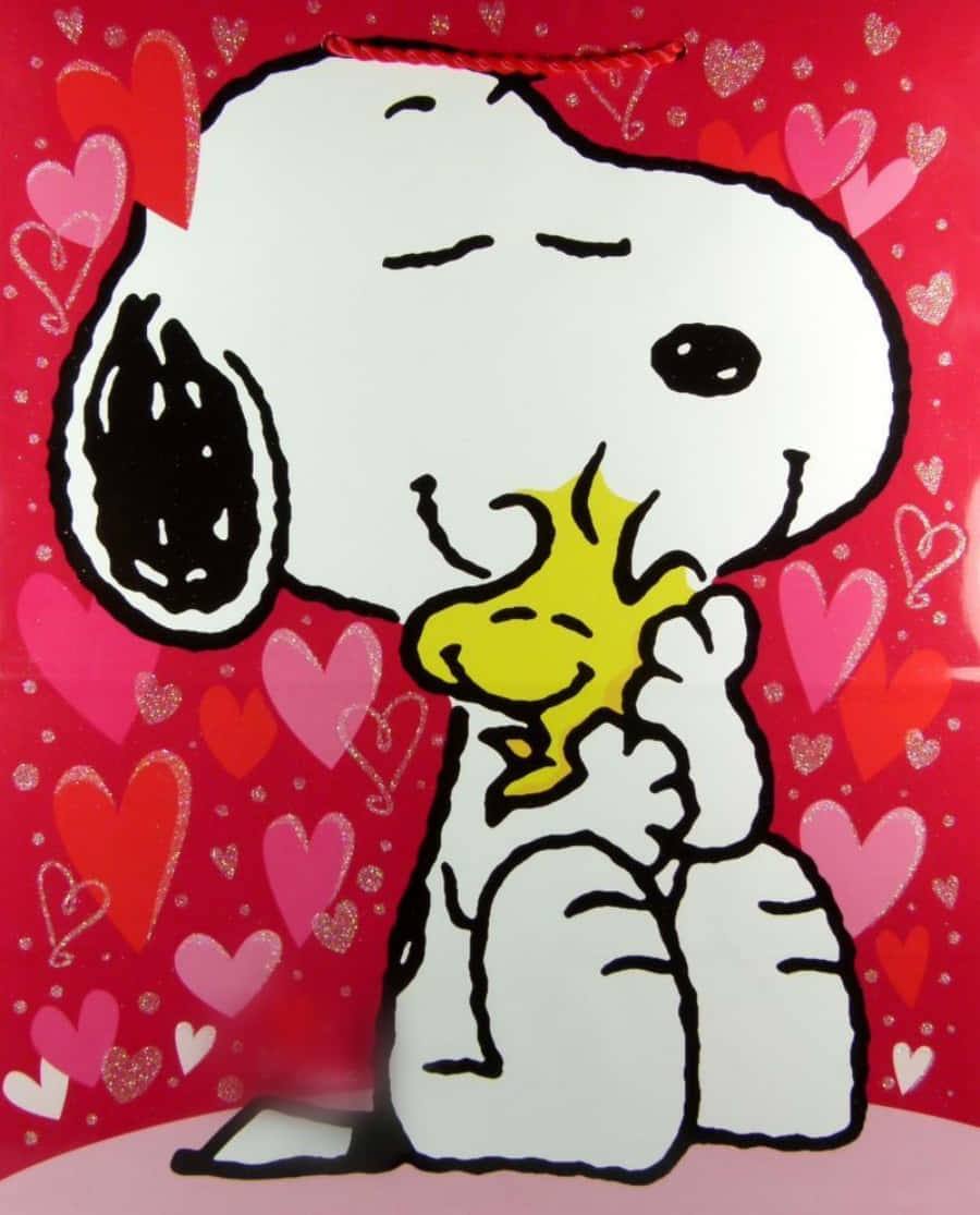 Snoopyabrazando A Su Mejor Amigo Woodstock En El Día De San Valentín. Fondo de pantalla