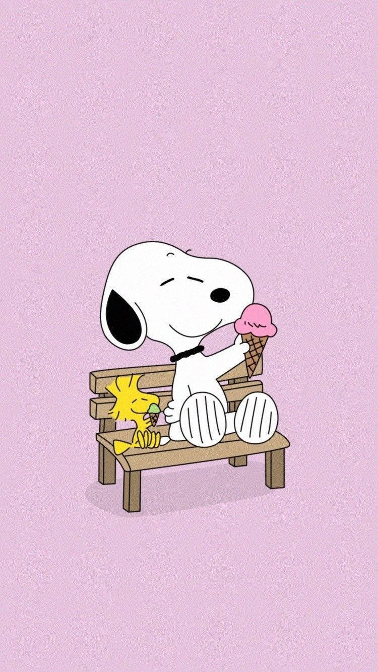 Snoopy and Woodstock Enjoying a Sweet Delight Wallpaper