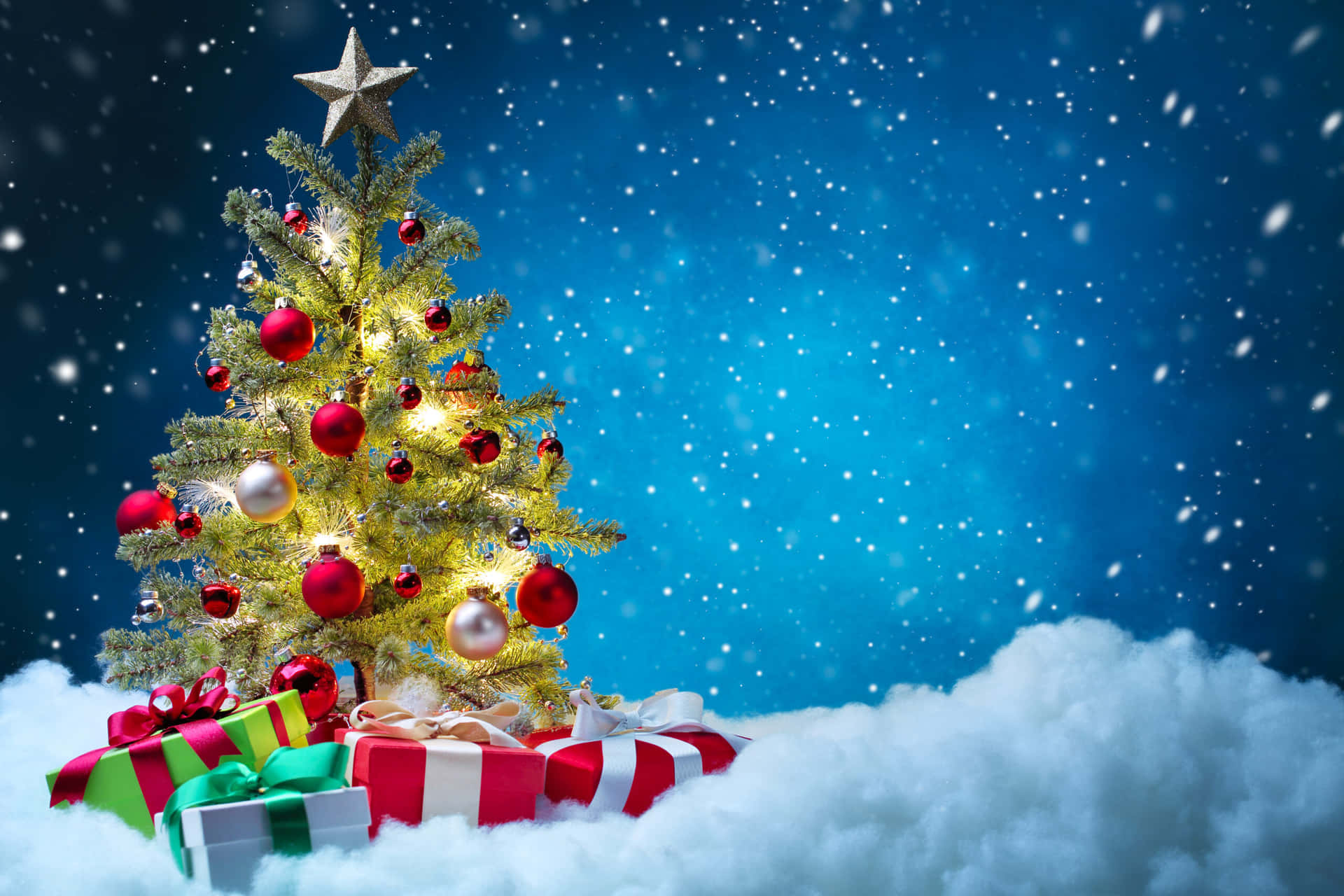 Geschenkeunter Dem Weihnachtsbaum Schnee Hintergrund