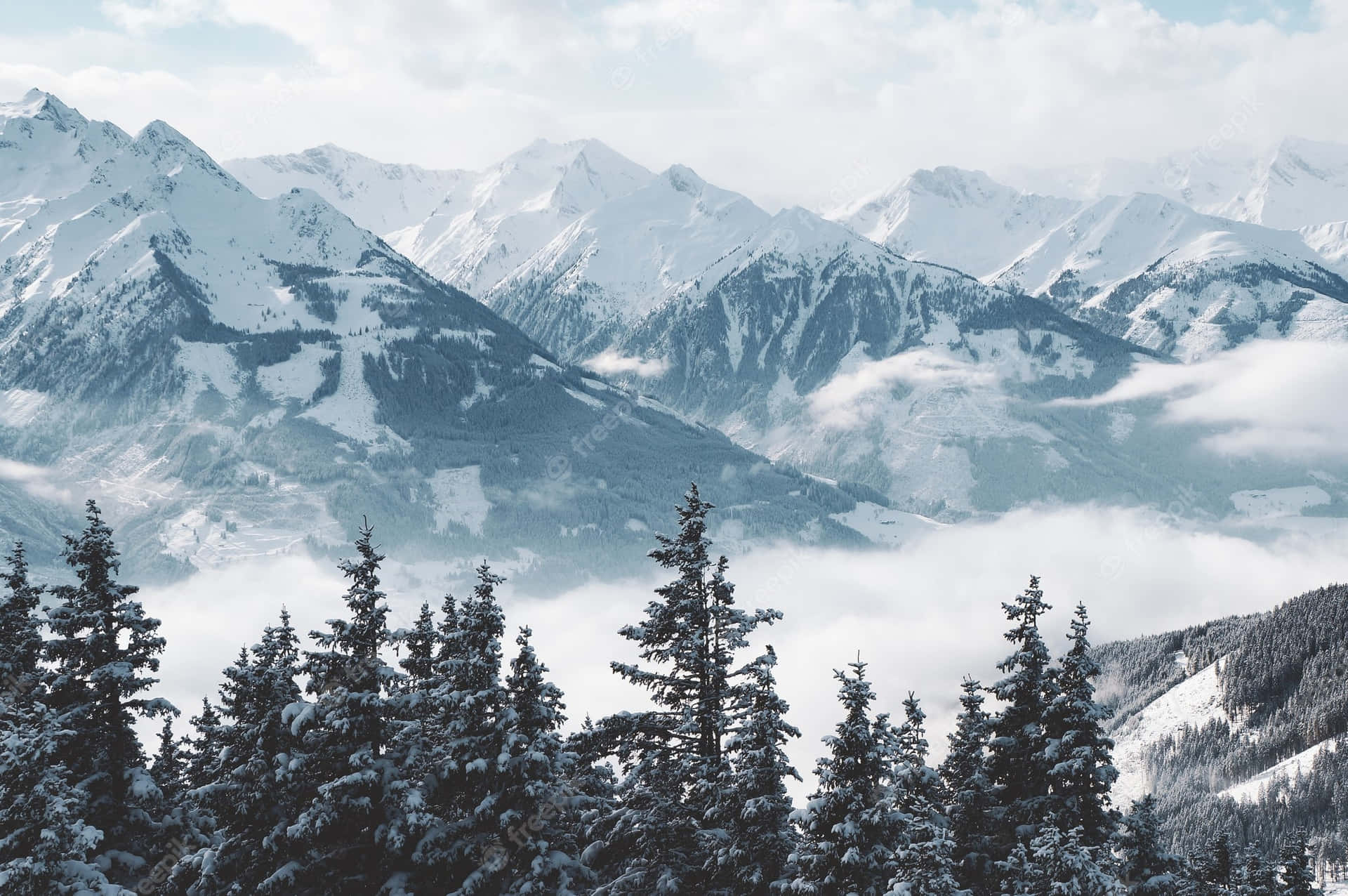 Download Snow capped mountain in beautiful scenery. | Wallpapers.com