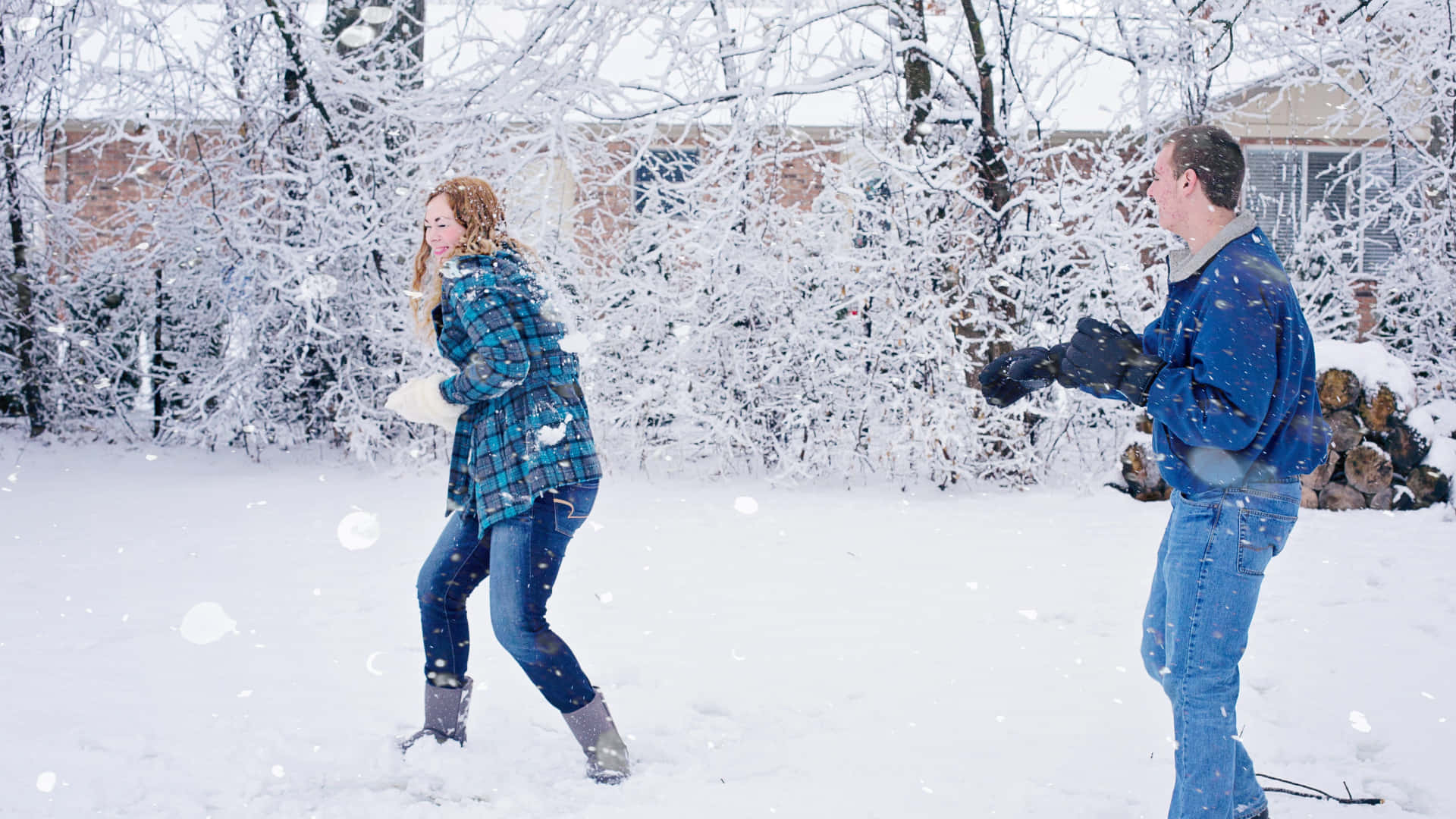 Exciting Winter Snowball Fight Wallpaper