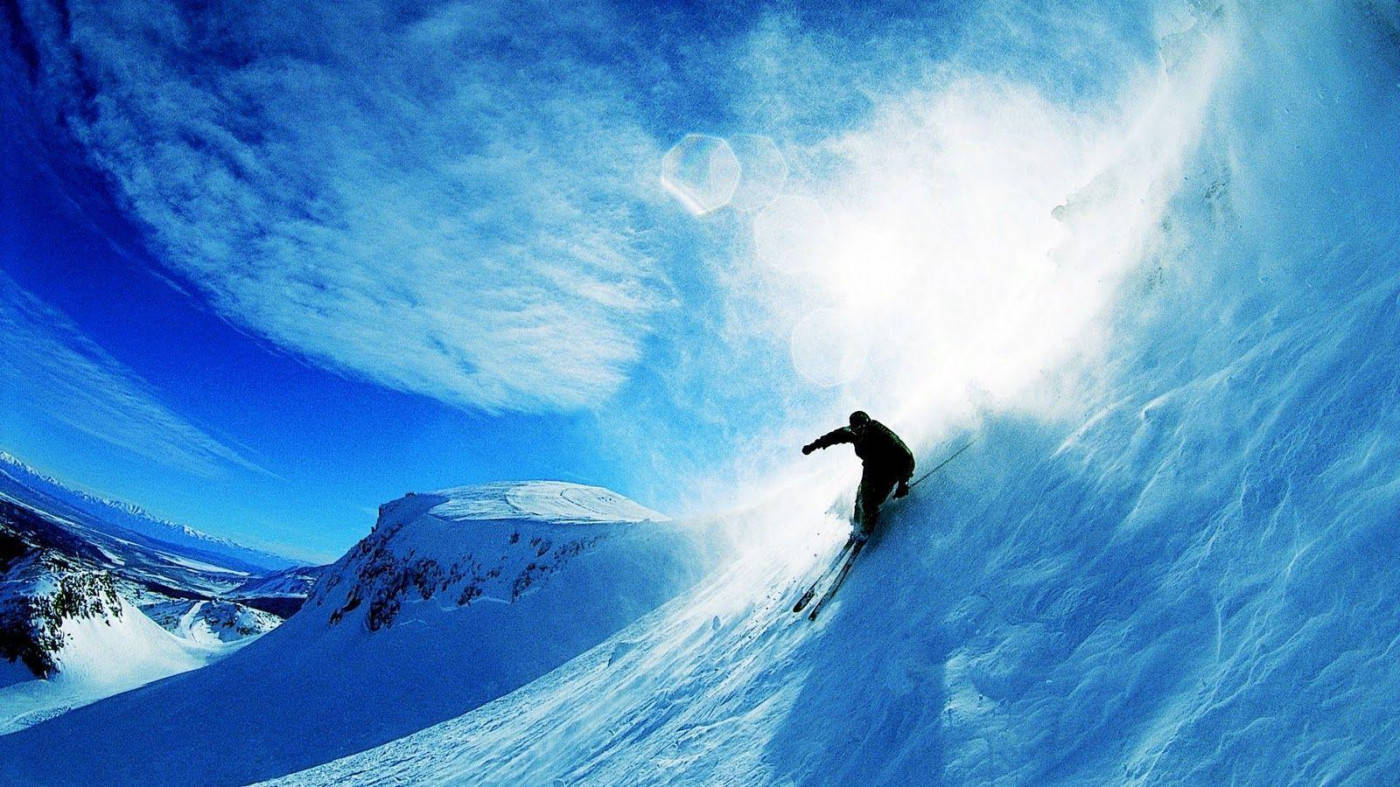 Snowboard Creating Wave Of Snow Background
