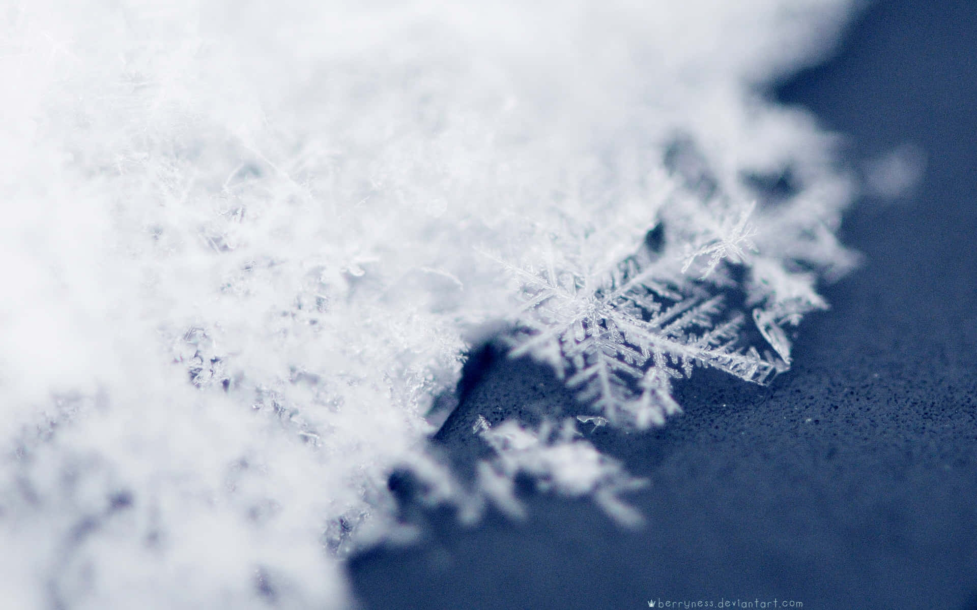 Enjoy winter's beauty with a view of a beautiful snowflake in a snow-covered landscape.