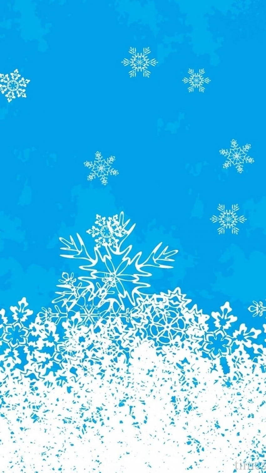 En blå baggrund med snefnug på det Wallpaper