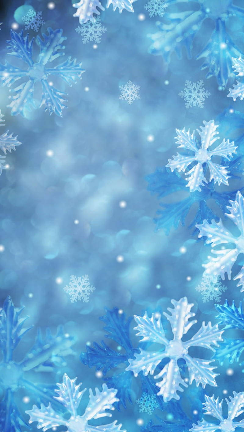 Erlebensie Die Schönheit Der Natur Auf Dem Schneeflocken-iphone Wallpaper