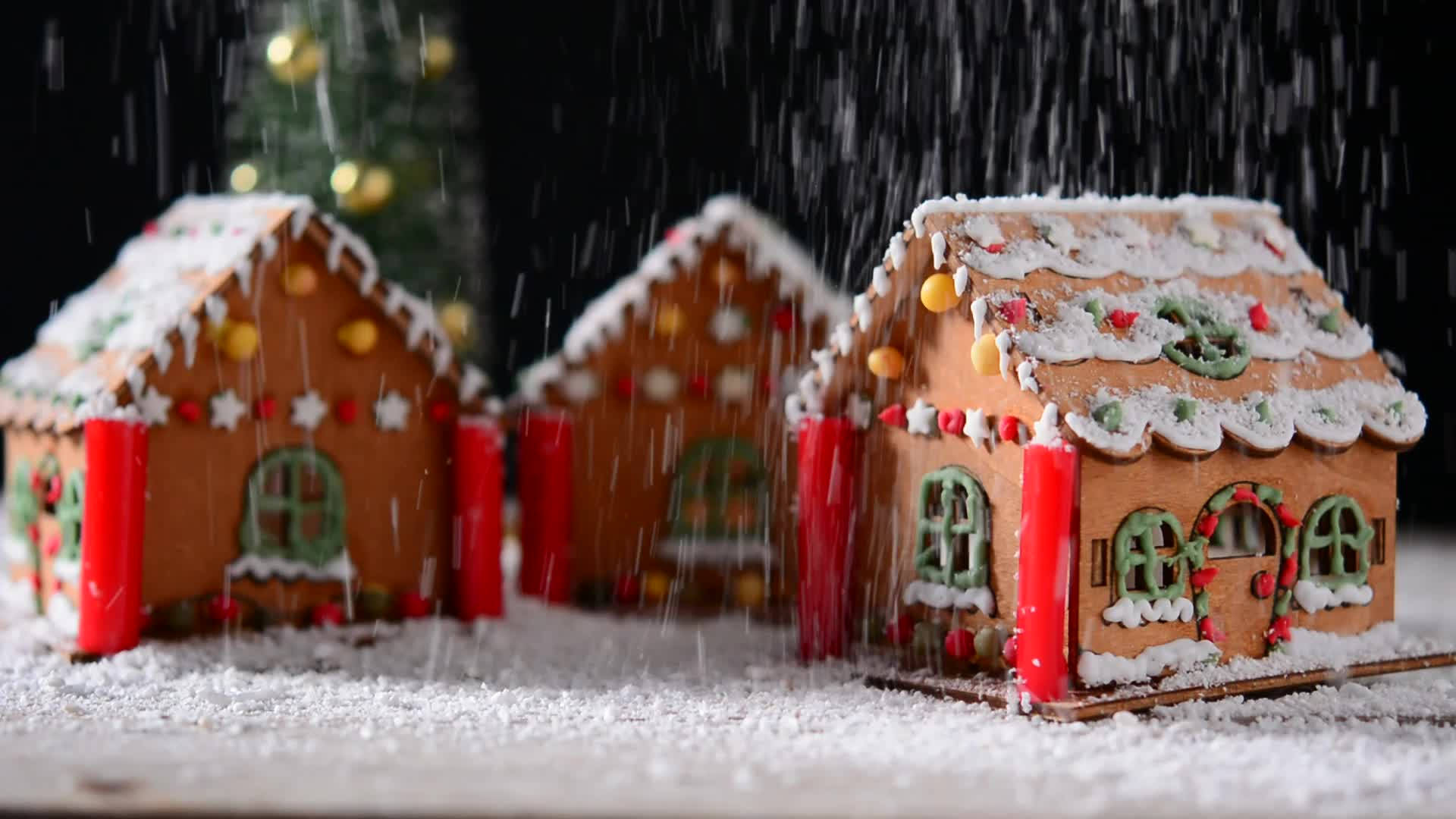 "Enchanting Snowy Gingerbread House Nestled in a Christmas Fantasy." Wallpaper