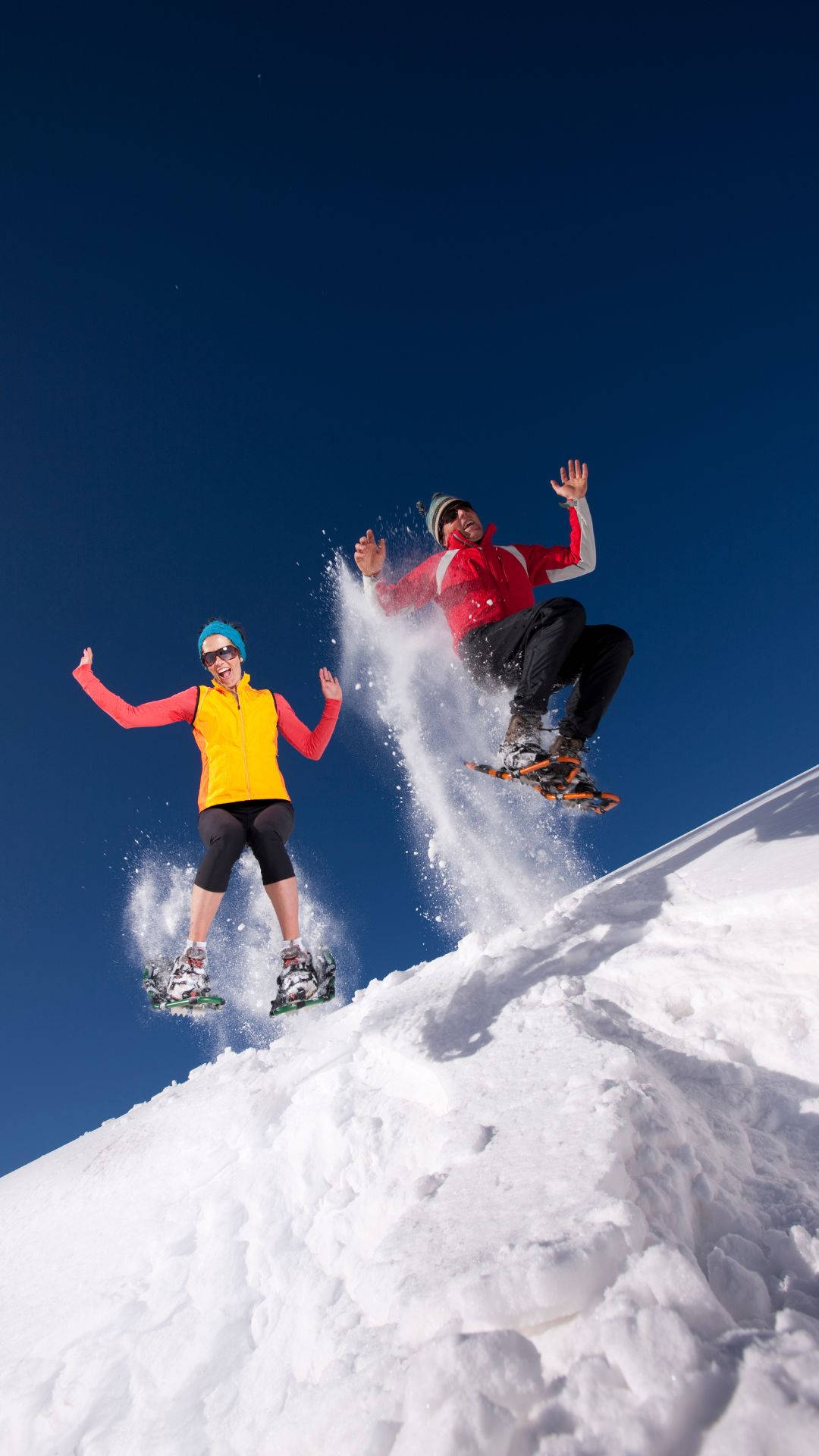 Snowshoeing Snow Mountain Jump Pose Wallpaper