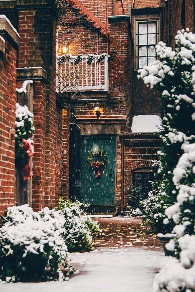 Snowy_ Brick_ Building_ Entrance_ Vintage_ Winter_ Aesthetic.jpg Wallpaper