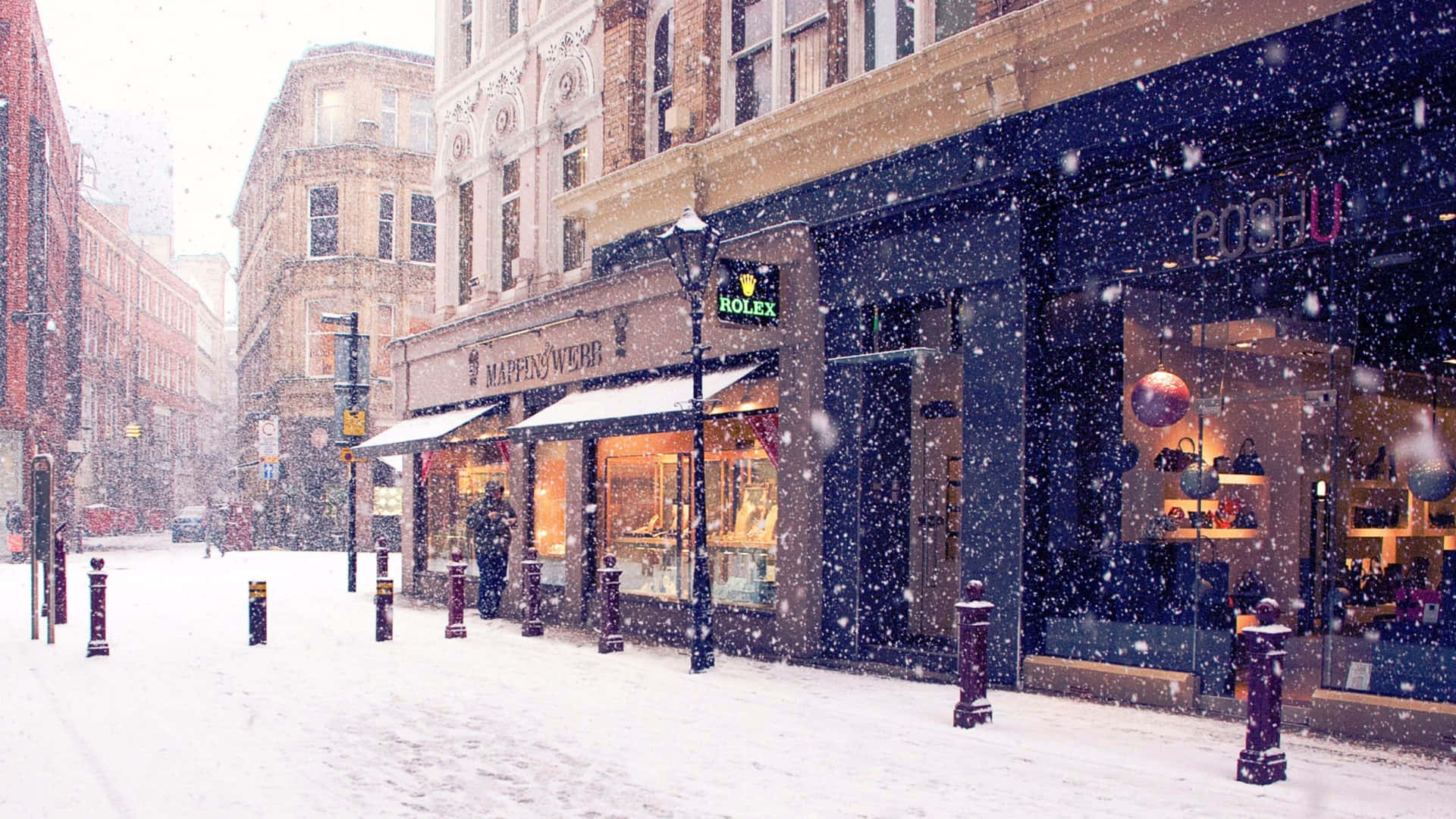 Snowy_ City_ Street_with_ Luxury_ Shops_ Vintage_ Winter_ Aesthetic.jpg Wallpaper
