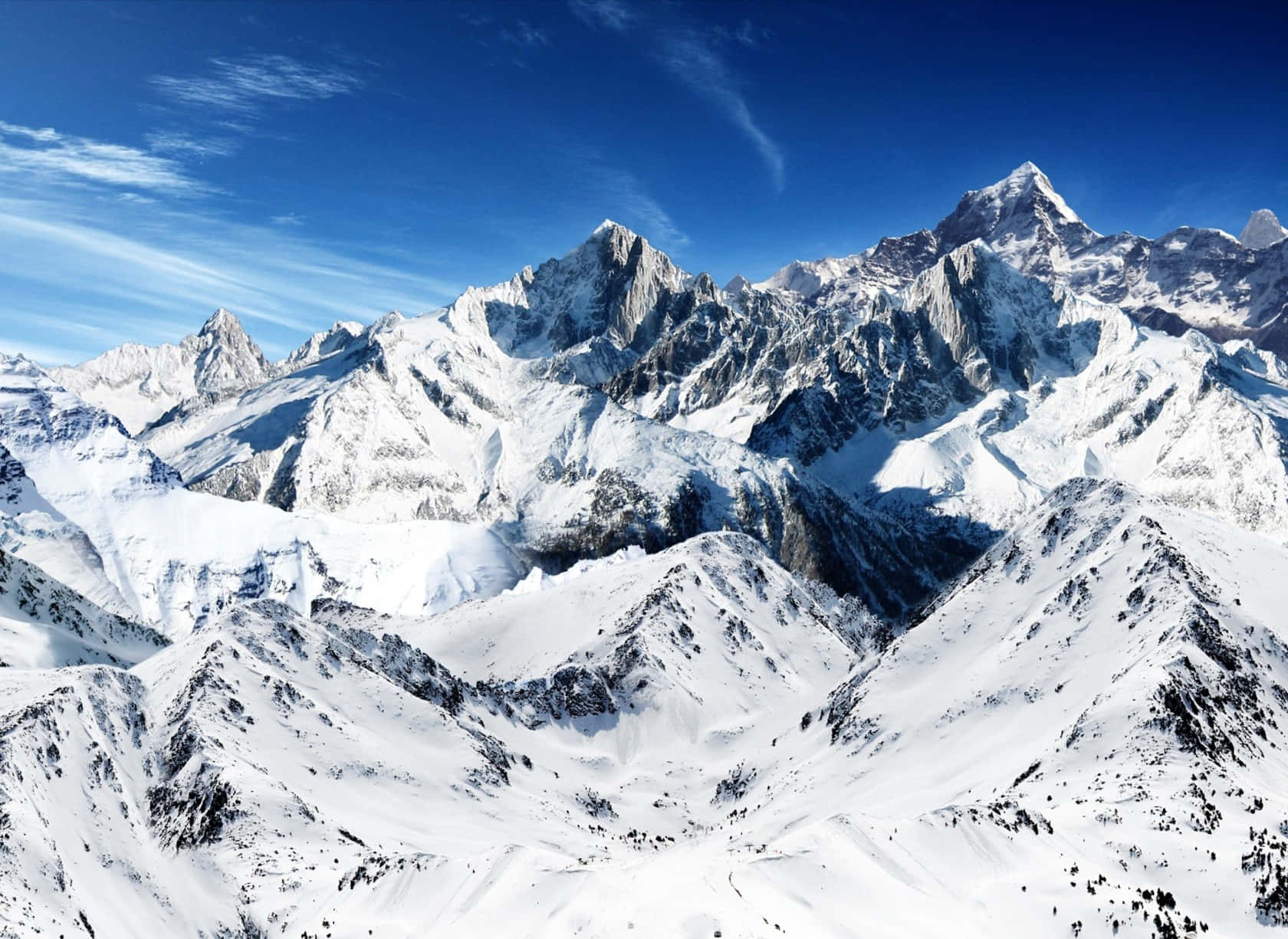 A stunning view of a snow-capped mountain range.