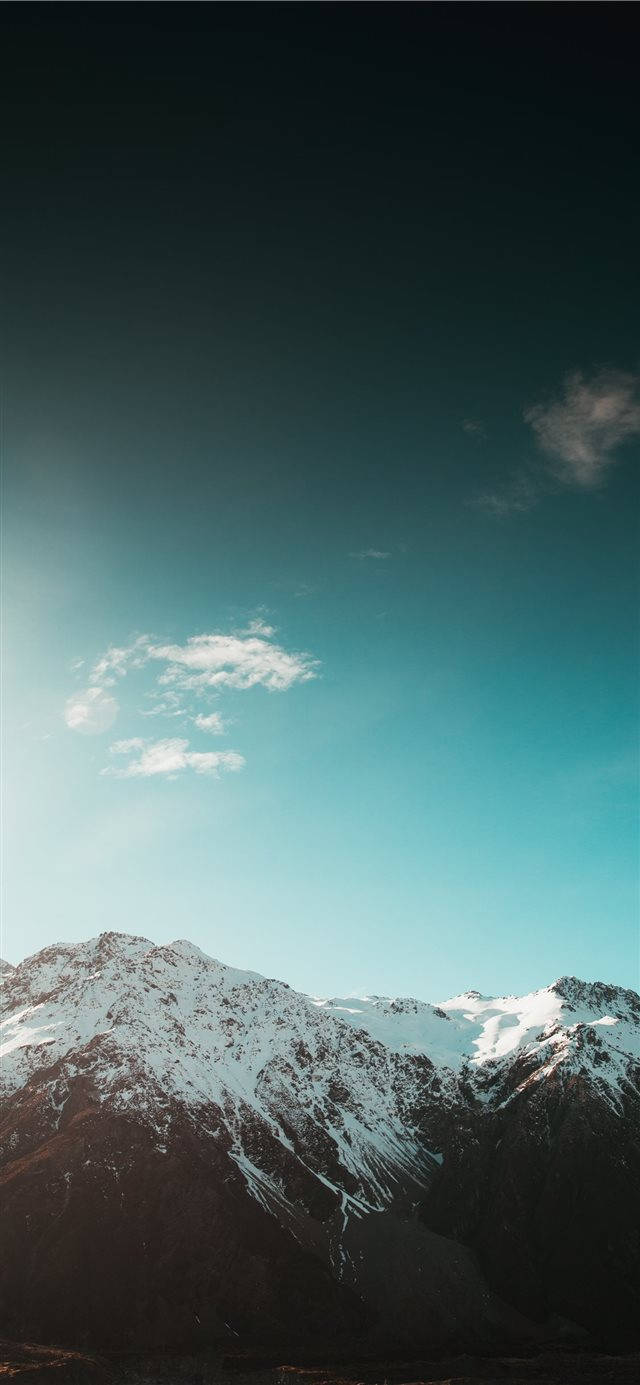 Sneklædte bjerglandskab iPhone iOS 10 tapet Wallpaper