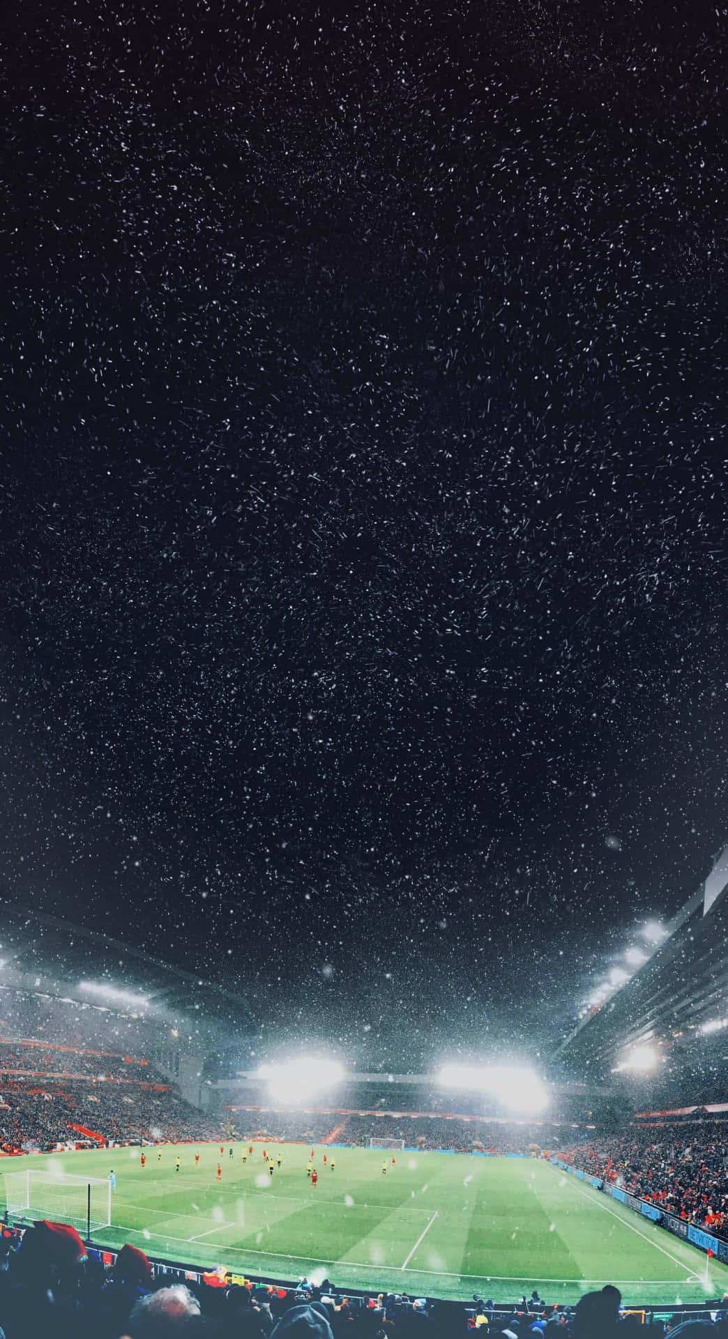 Snowy Night Football Match Wallpaper