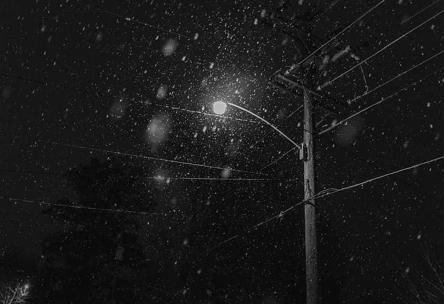 Snowy_ Night_ Under_ Streetlight.jpg Wallpaper