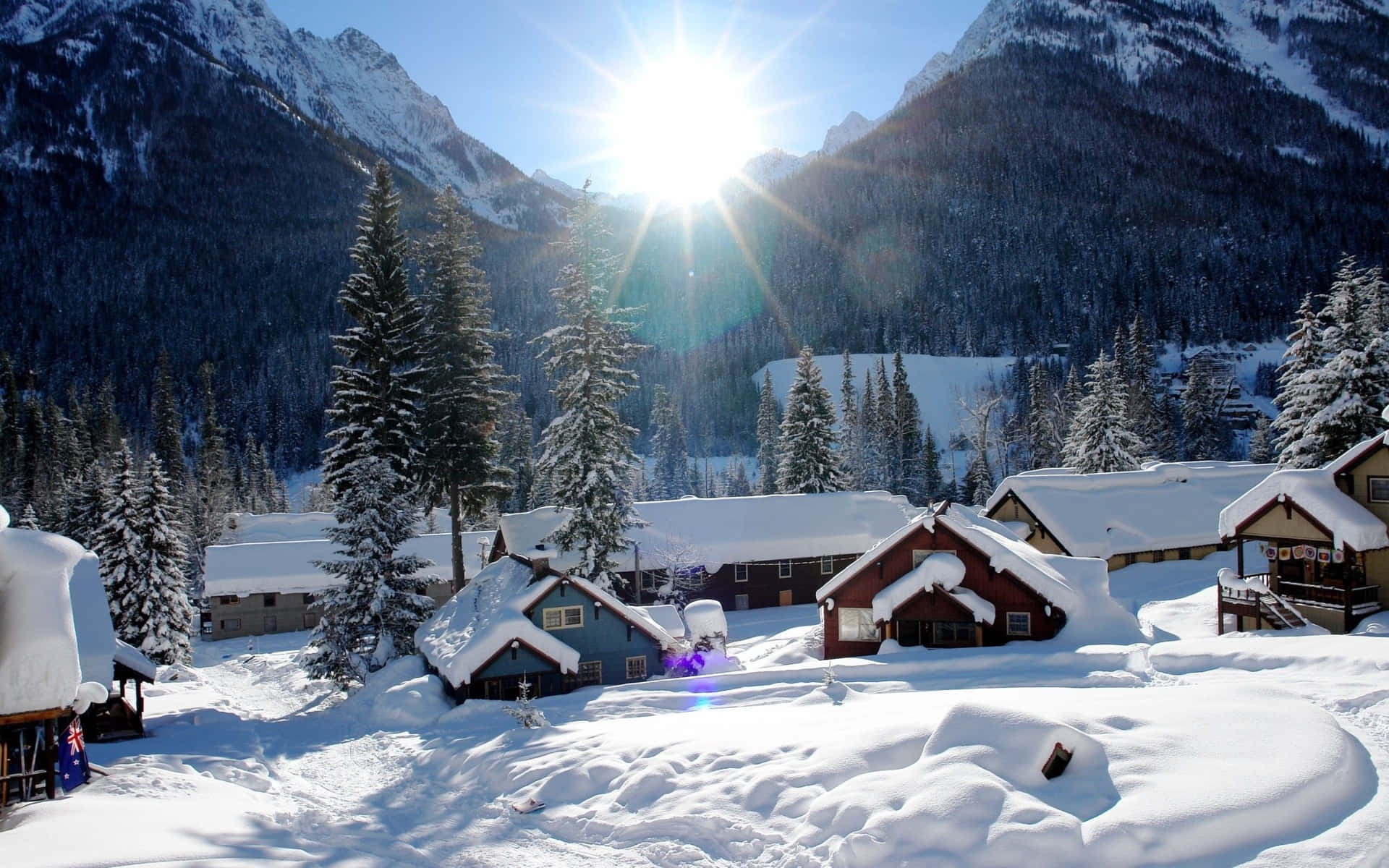 Picturesque Snowy Village in Winter Wallpaper