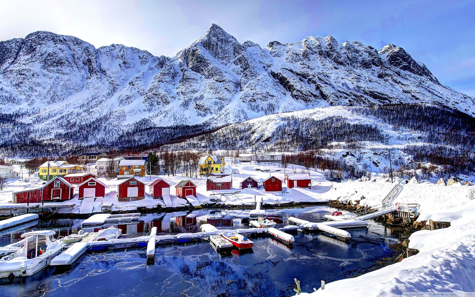 Peaceful Snowy Village in Winter Wallpaper