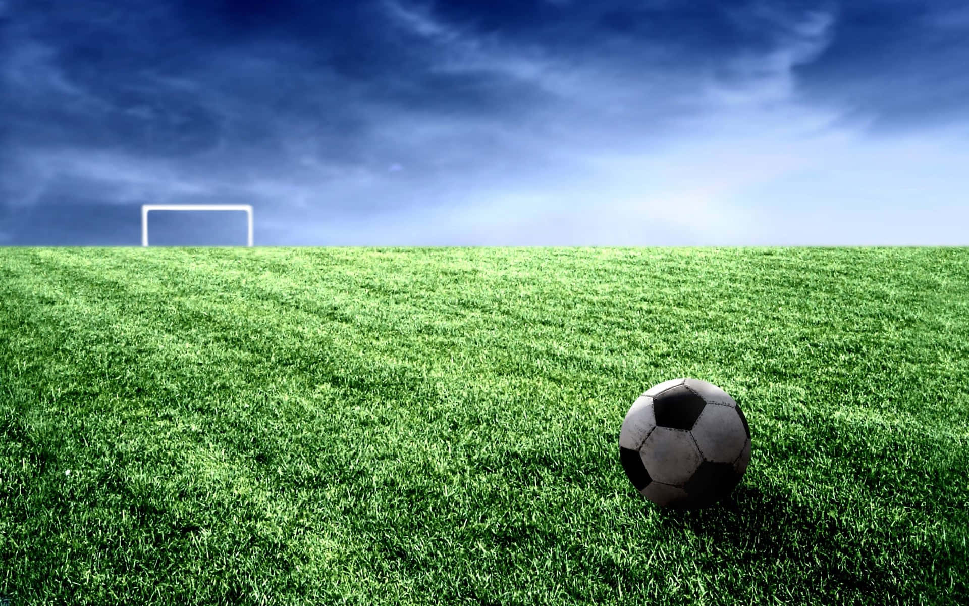 soccer field with ball wallpaper