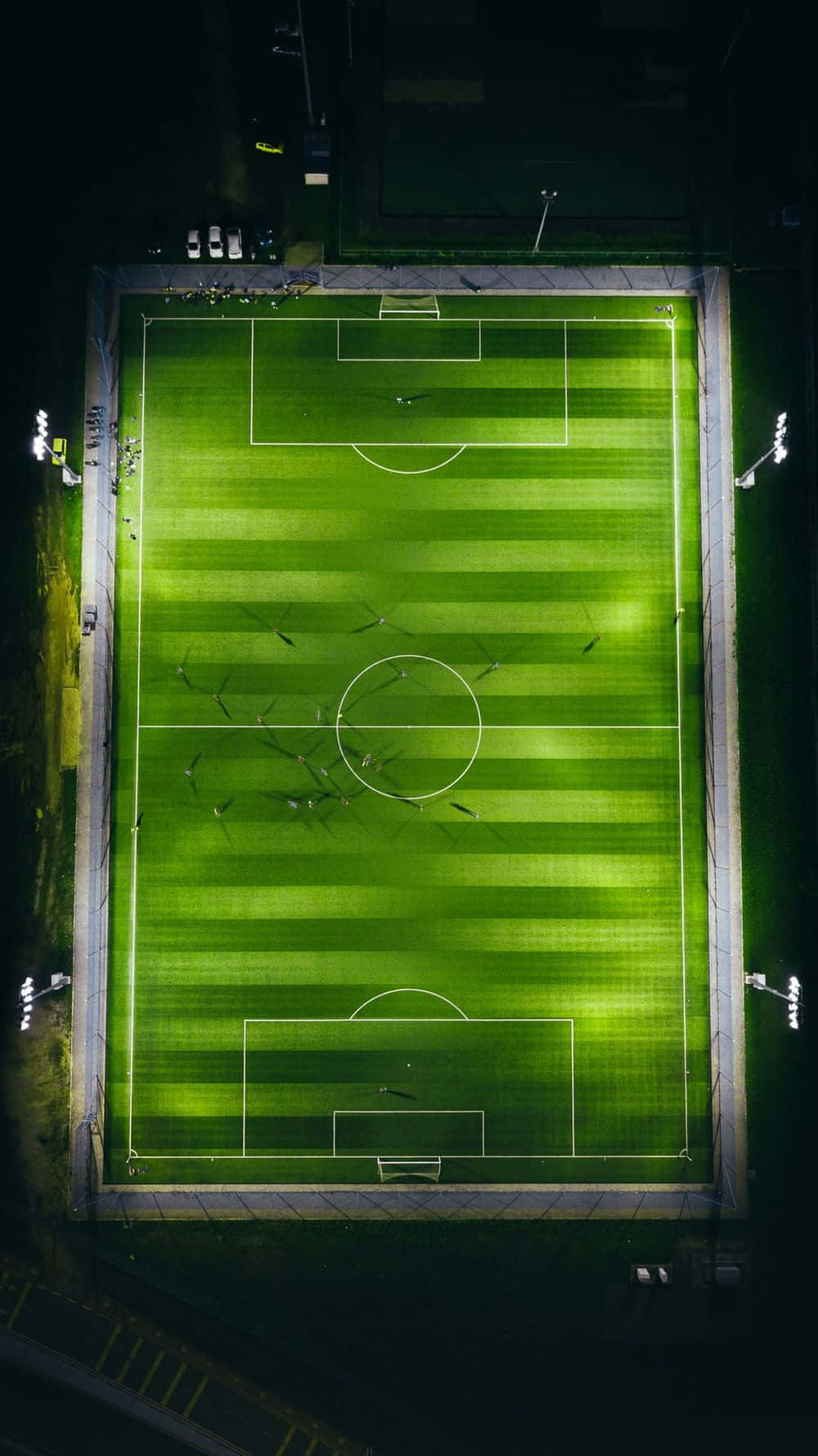 Mörkgrönbakgrund Med Fotbollsplan.