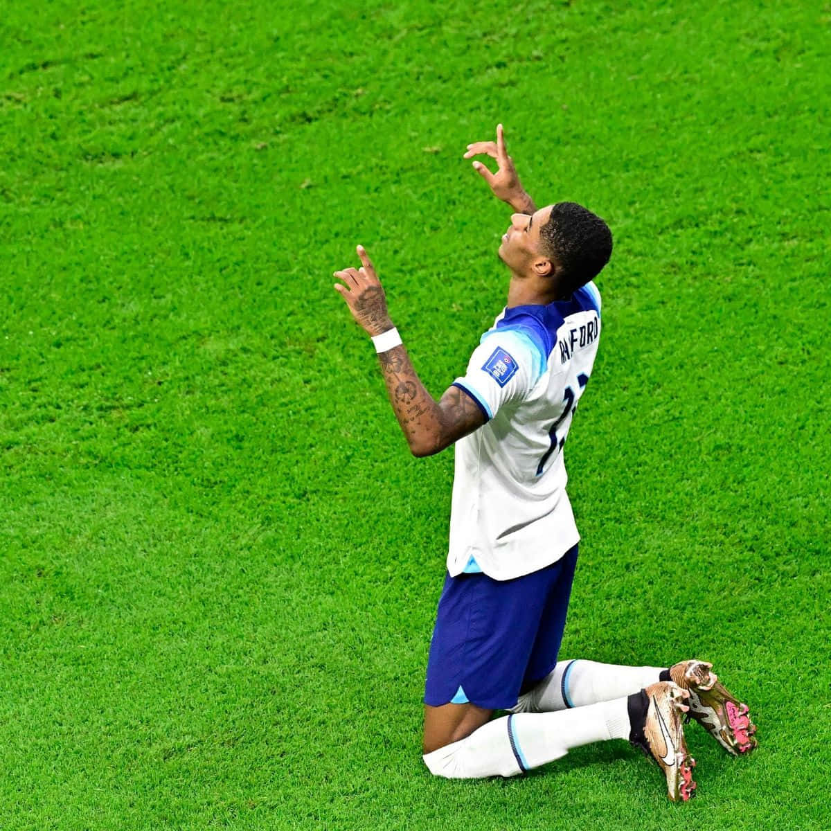 Soccer_ Player_ Celebrating_ Goal_ On_ Knees Wallpaper