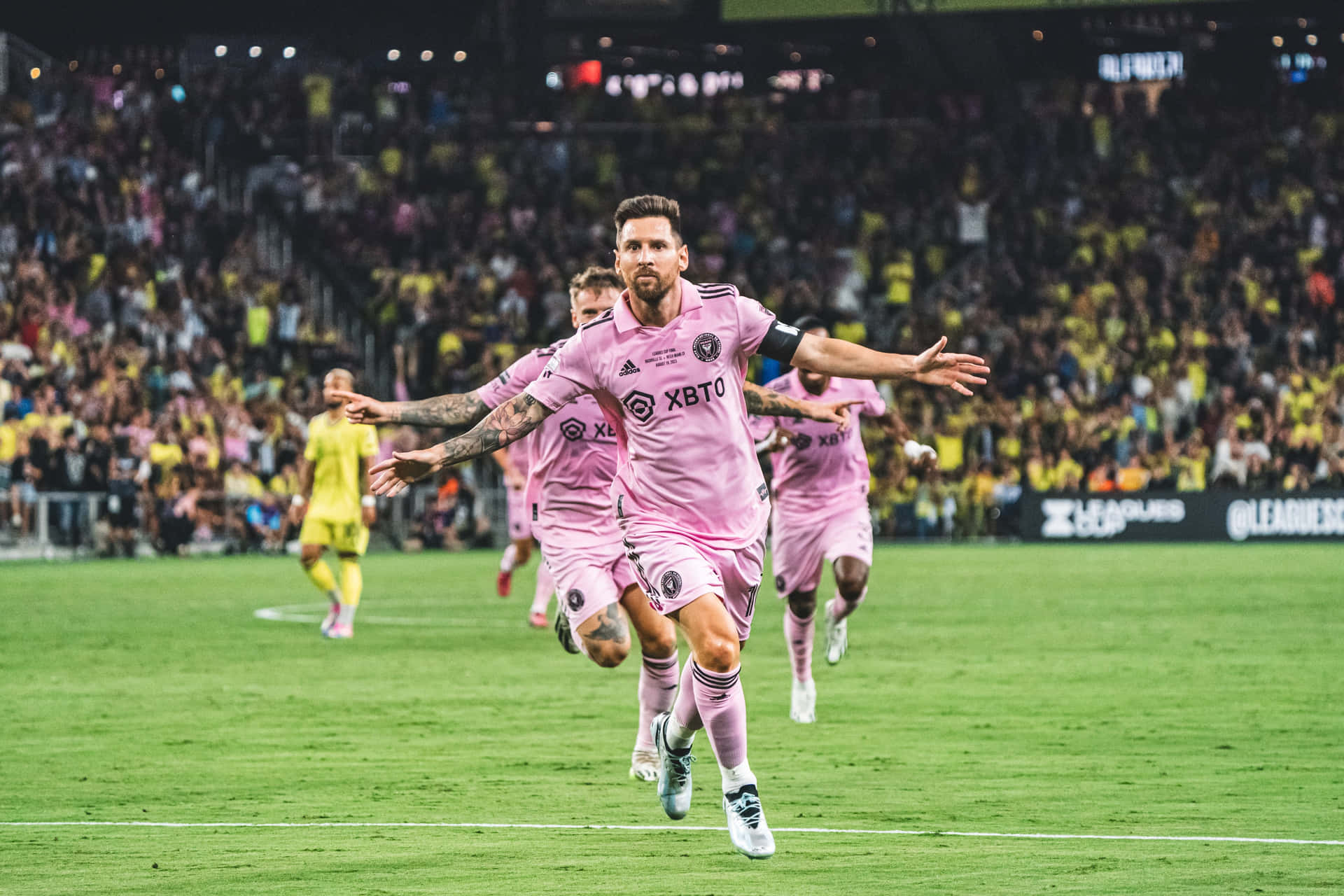 Soccer_ Player_in_ Pink_ Jersey_ Celebrating Wallpaper
