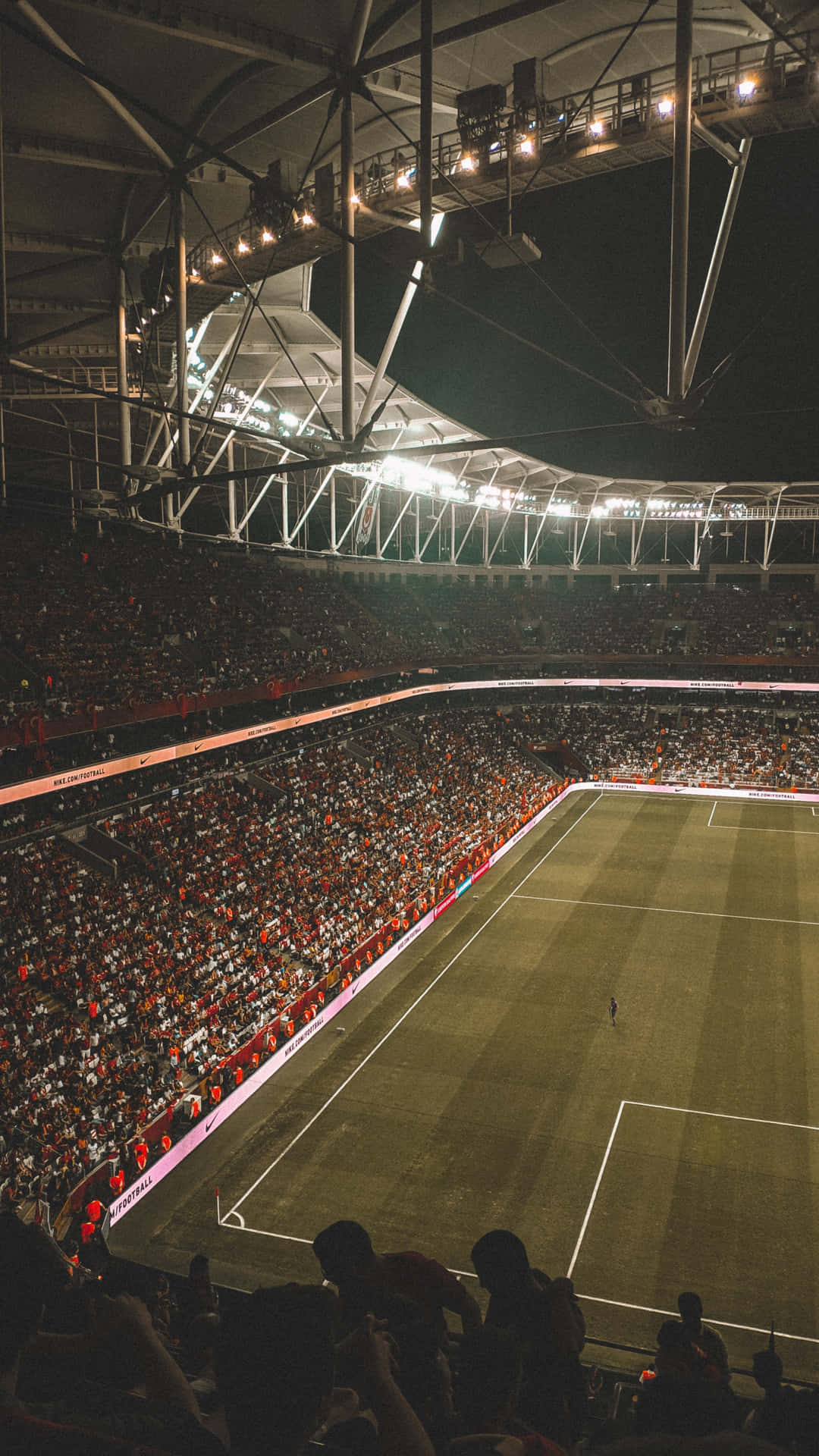Exciting match under the bright lights at a modern soccer stadium