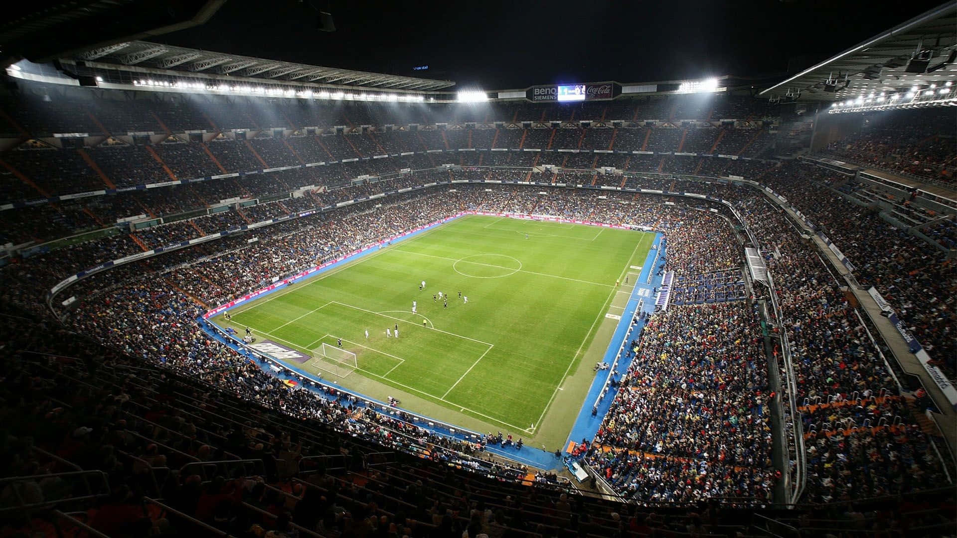 Imagende Un Gran Y Vibrante Estadio De Fútbol En Día De Partido. Fondo de pantalla