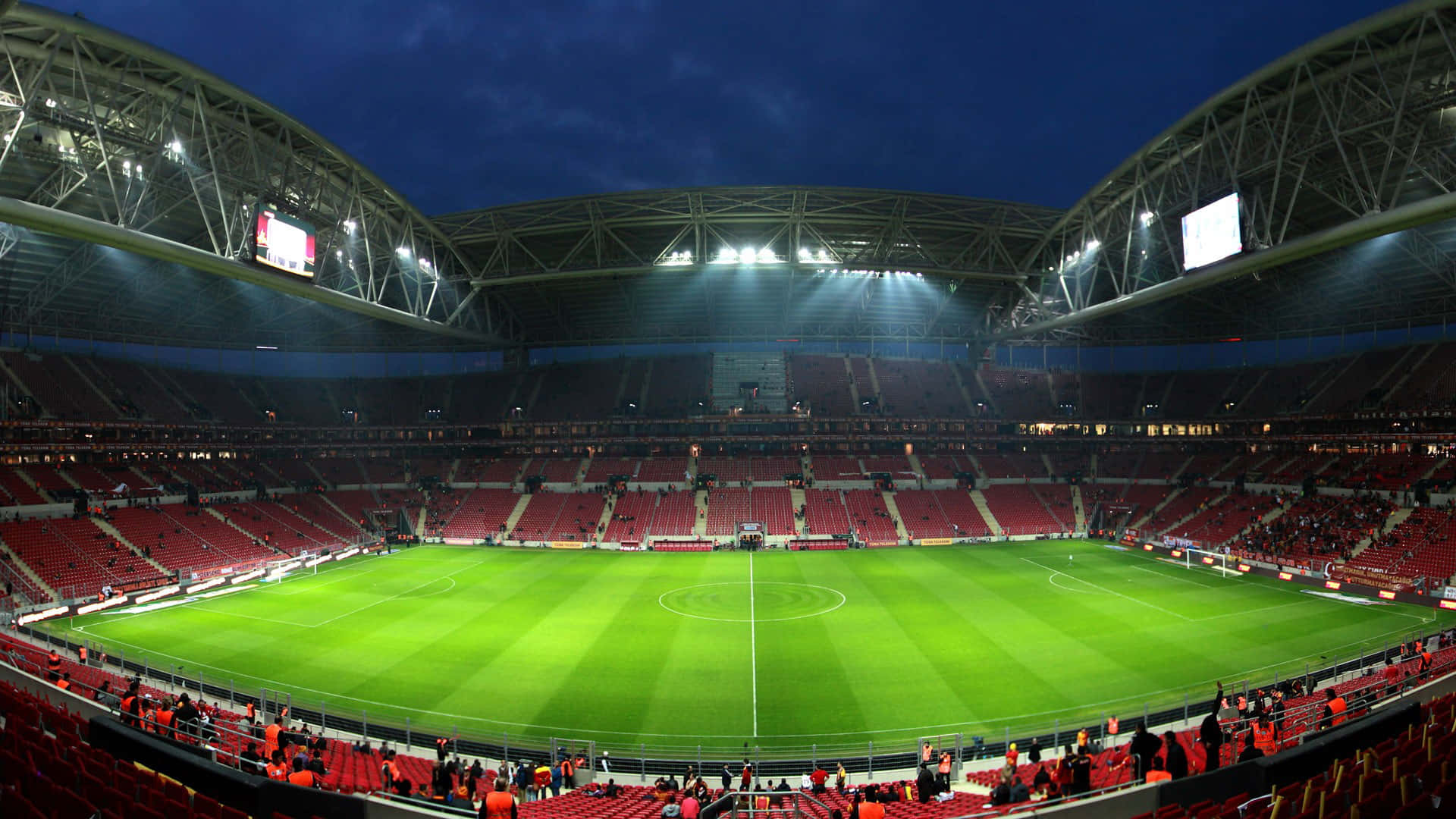 Fútbolcon Vista - Estadio Espectacular Iluminado Por La Puesta De Sol. Fondo de pantalla