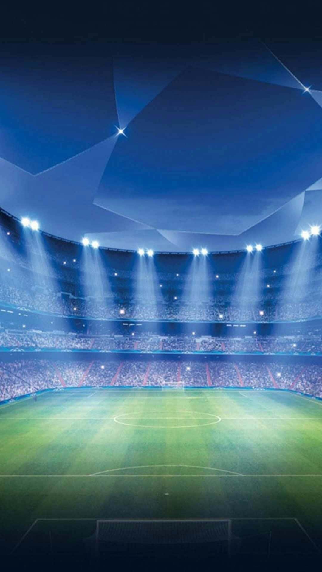 Lystige fans nyder et fodboldkampe på et stadion Wallpaper