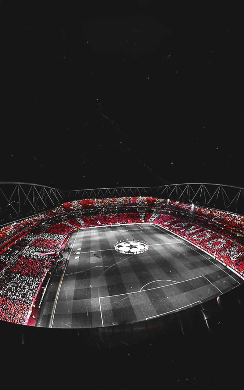 Get Ready for the Big Match in a Packed Soccer Stadium Wallpaper