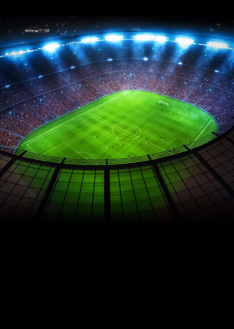 The beauty of a Soccer Stadium at night. Wallpaper