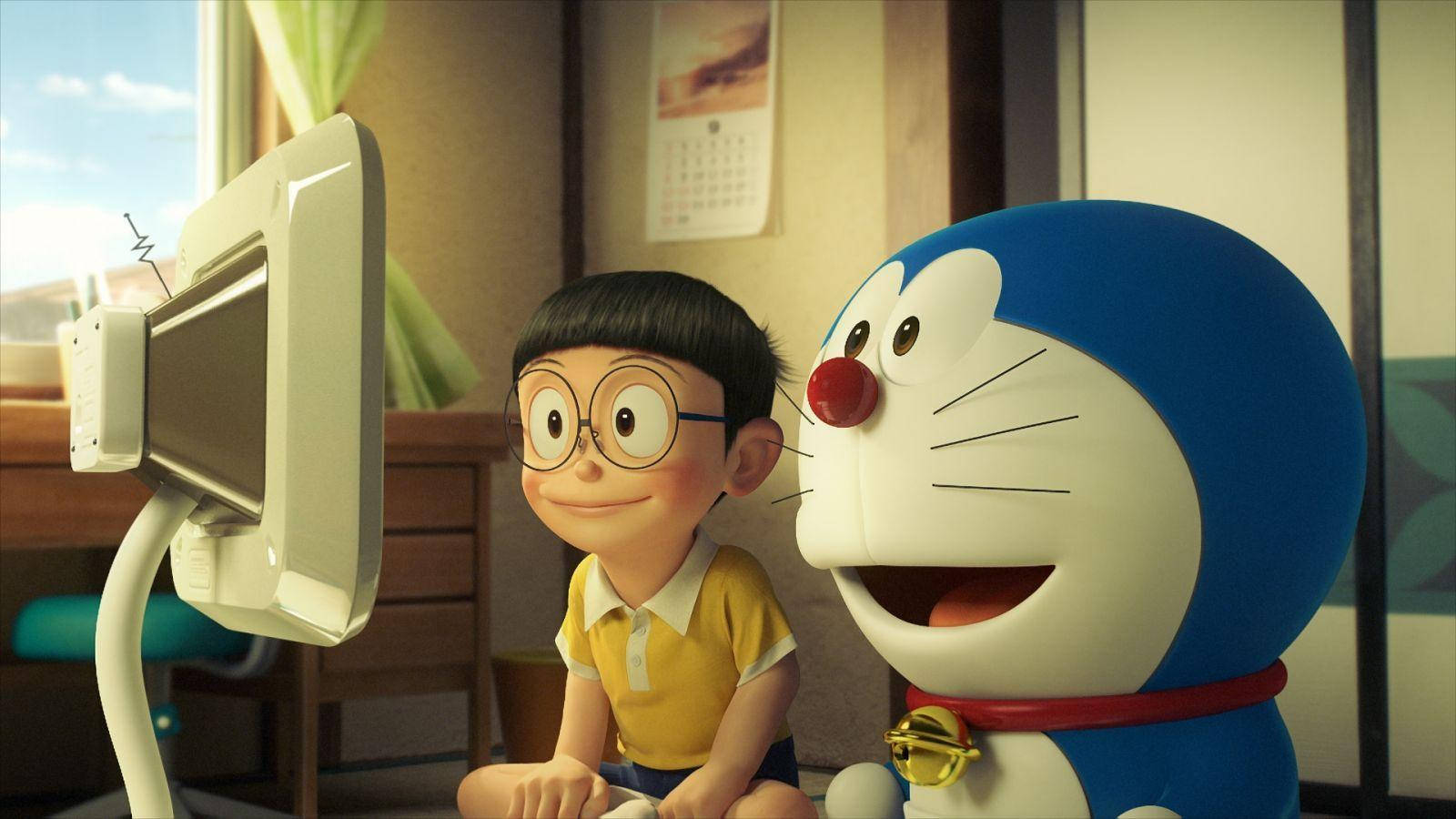Sød Nobita Ser Tv Med Doraemon Wallpaper