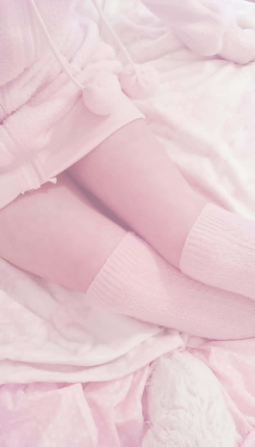 Soft Pink Comfort_ Socks And Sweater Wallpaper
