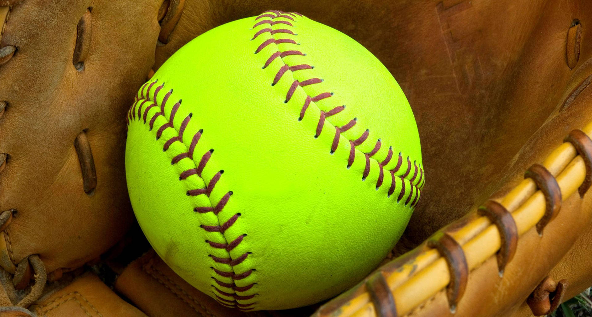 Softball Inside Of A Leather Mitts Wallpaper