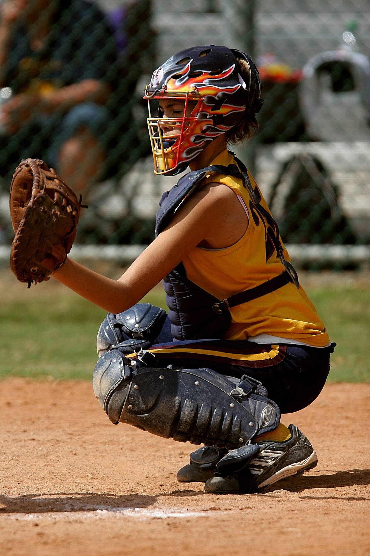Download Softball Player Wearing Chest Protector Wallpaper 