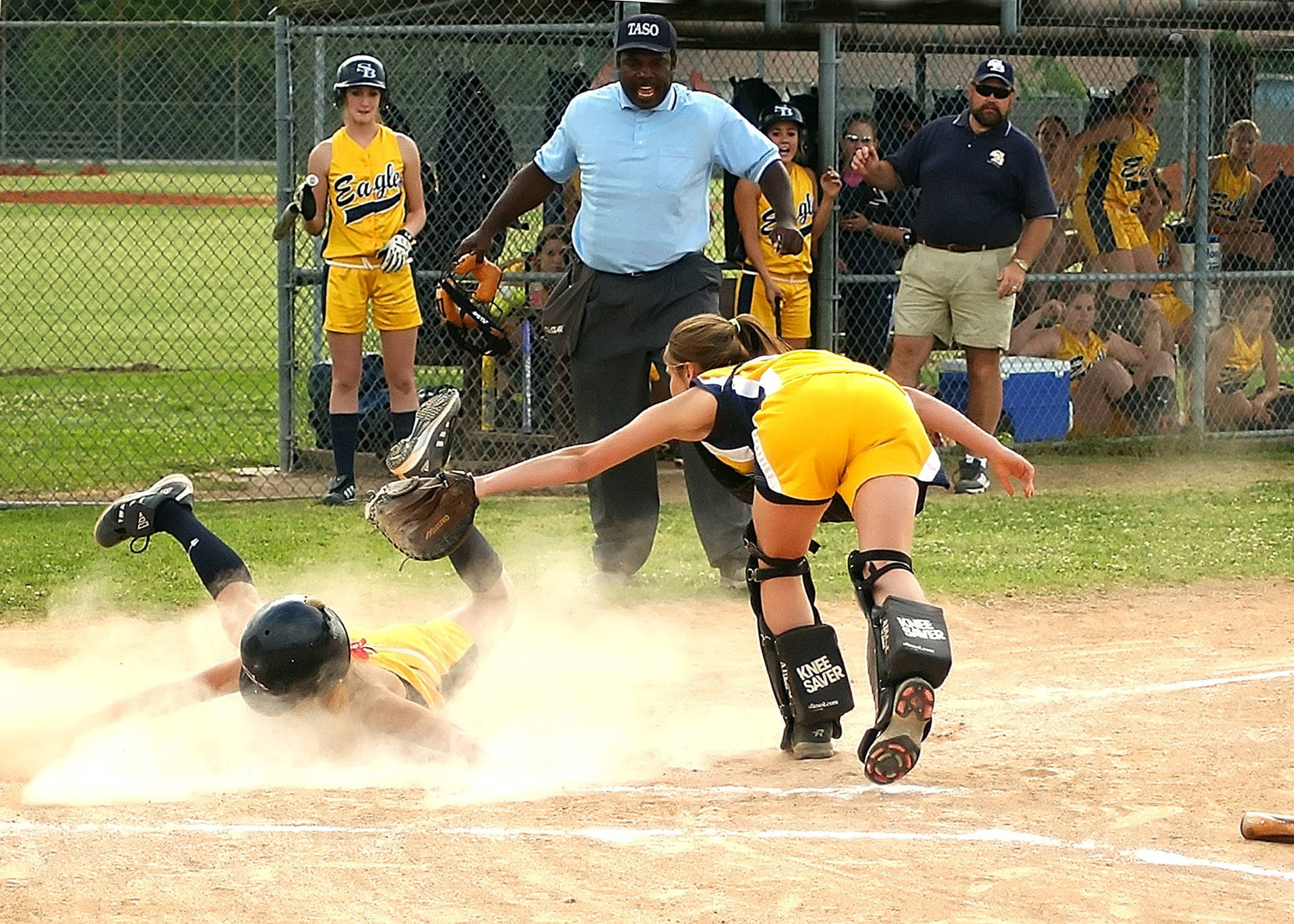 Softball Players In Action Wallpaper
