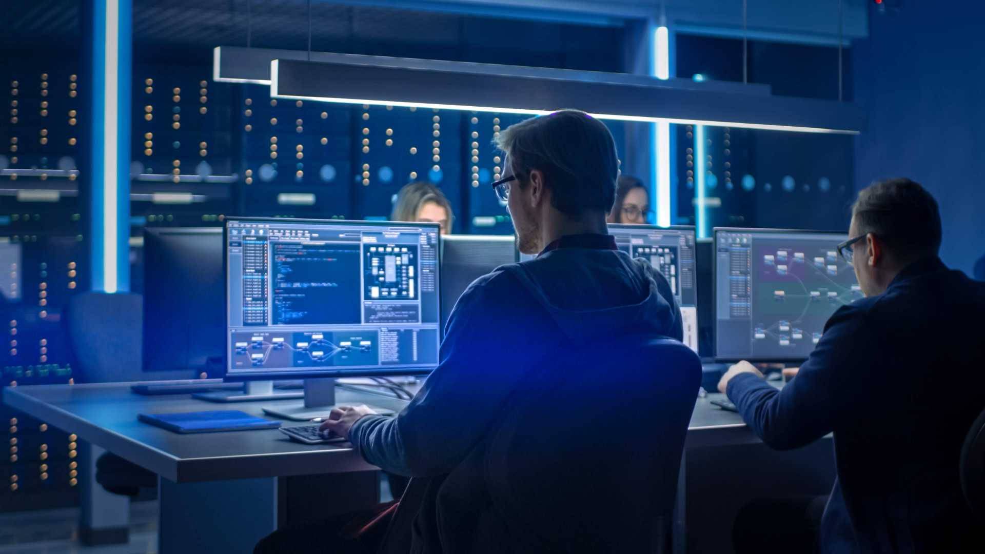 Software Engineers Using Computers Background