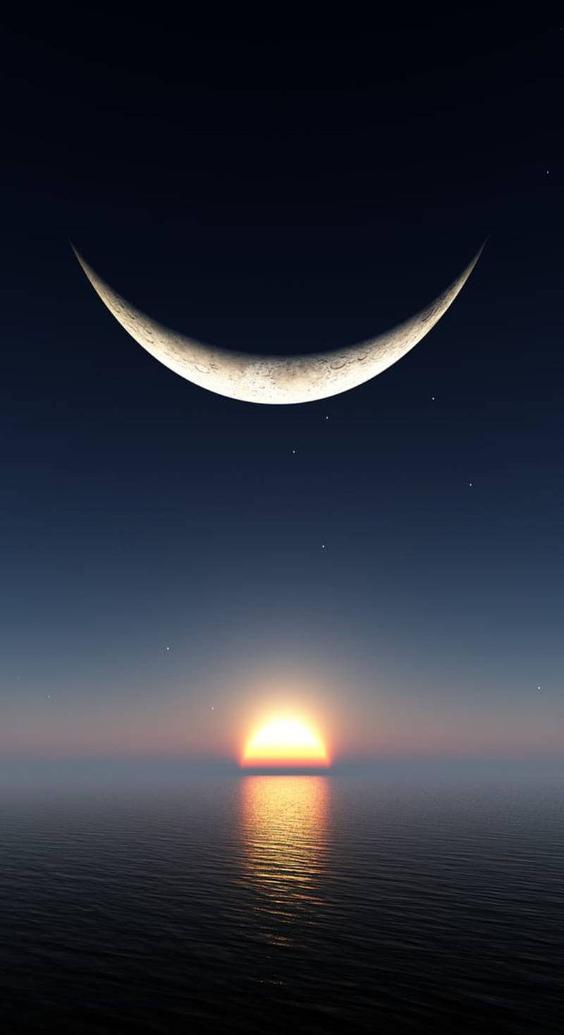Sun And Moon Over The Ocean Wallpaper — A crescent moon hangs above a glowing sunrise reflecting on calm ocean waters under a starry twilight sky.
