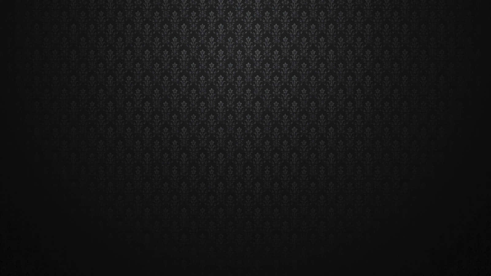 A Black Background With A Pattern