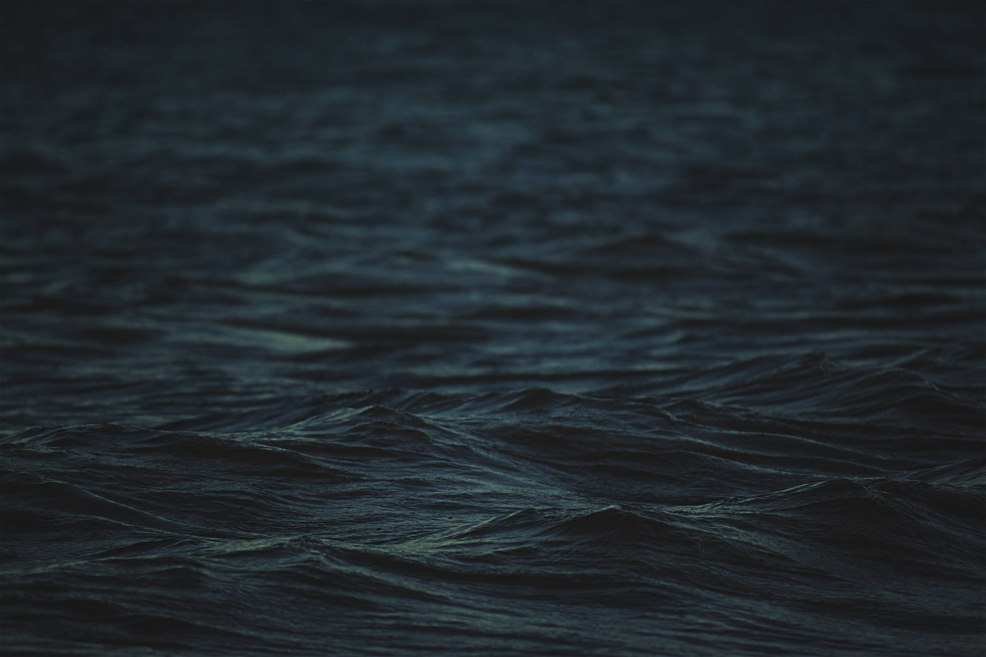 Solid Dark Blue Body Of Water Wallpaper
