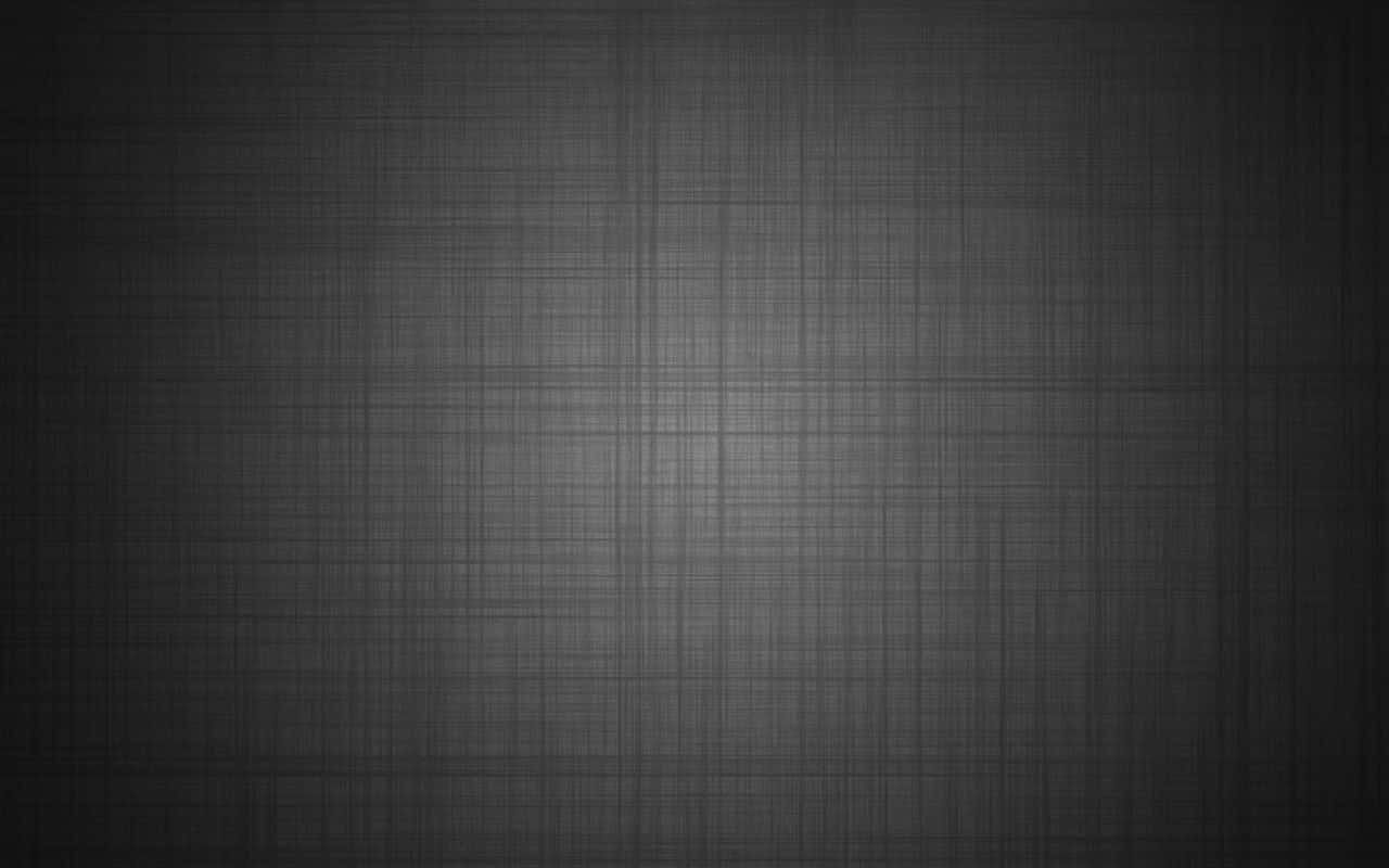 Solid Grey Background — A dark gray textured fabric background with subtle woven lines and soft gradient lighting.