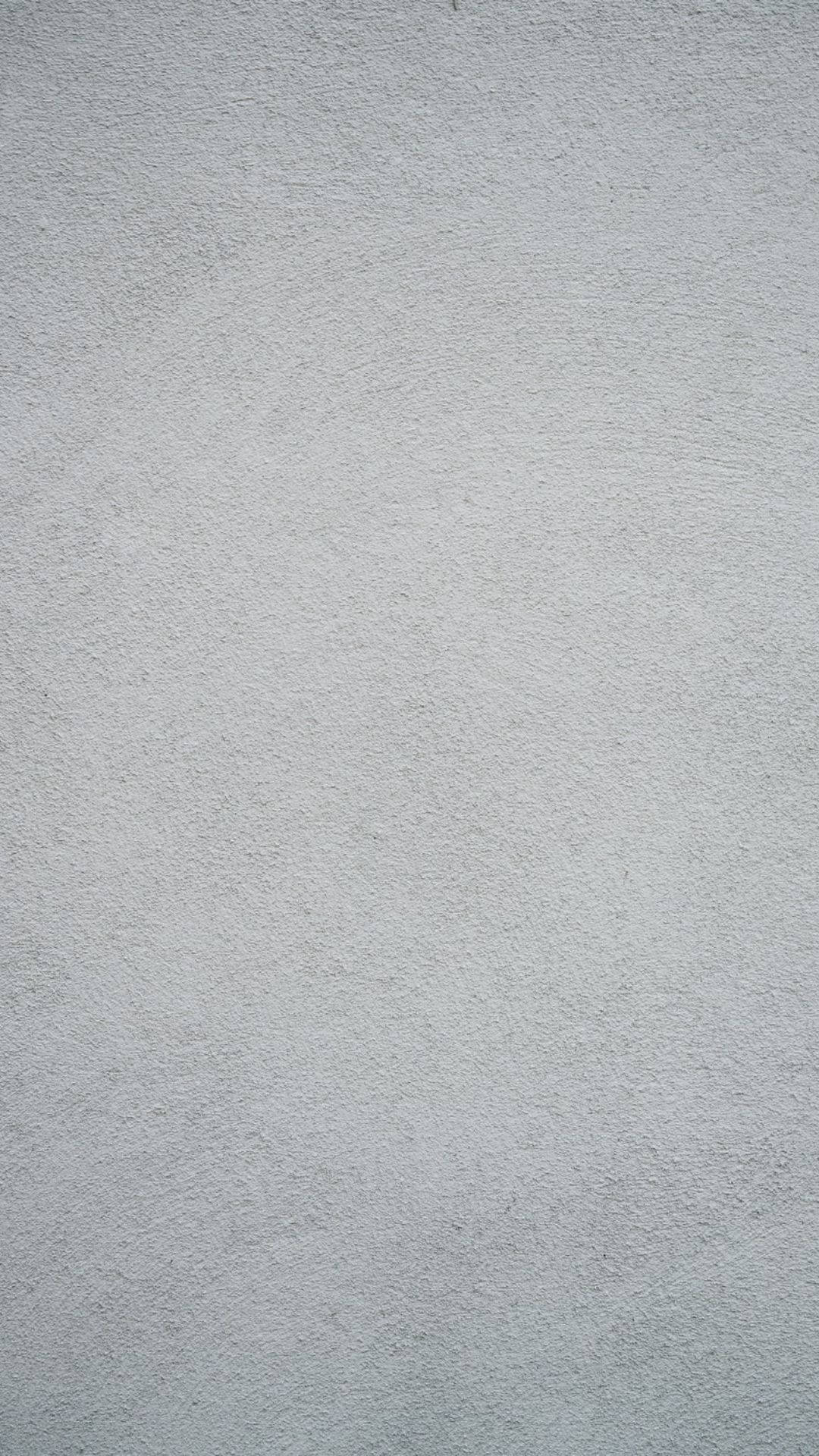 Solid Grey Wall With Subtle Speckles Background