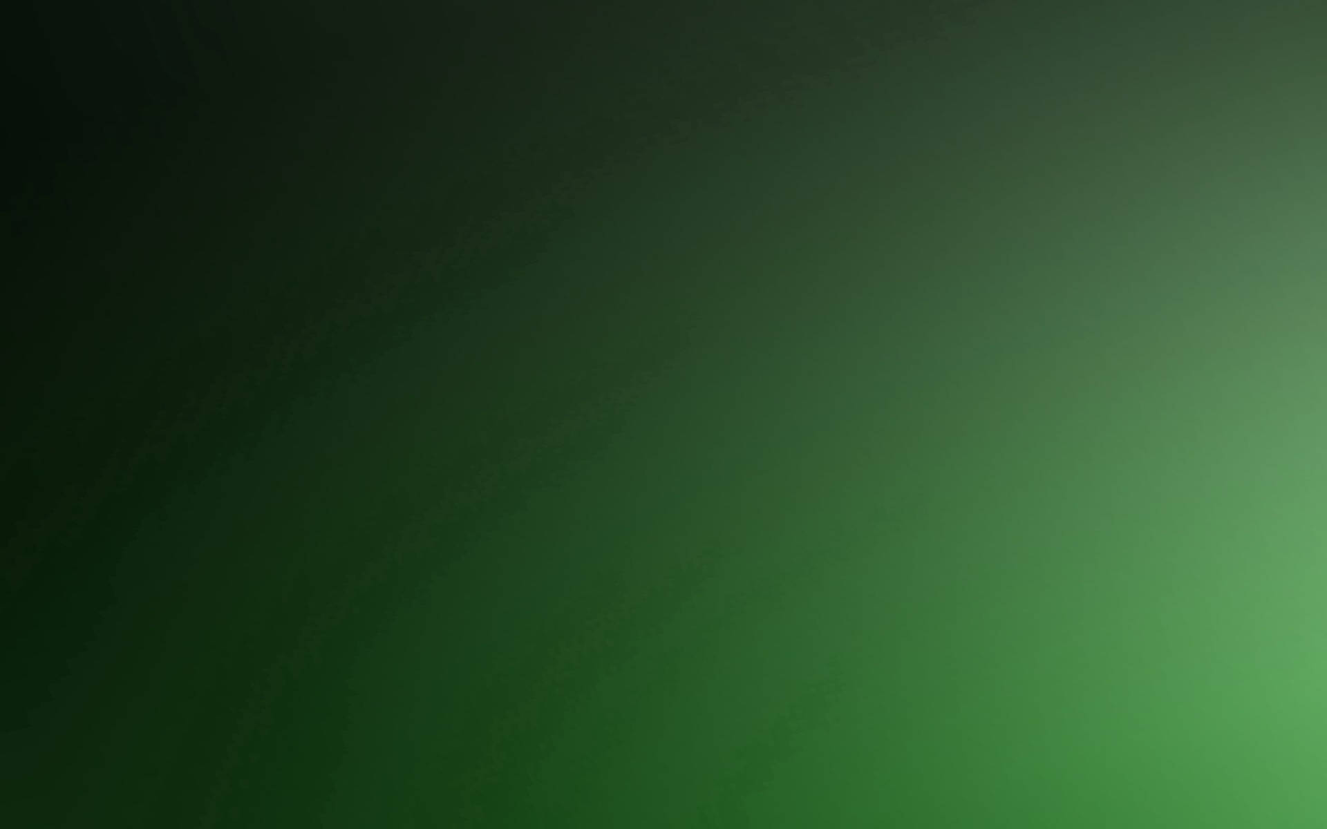 Abstract shading of green and black Wallpaper — A smooth gradient of dark to bright green with subtle texture and soft light transition.