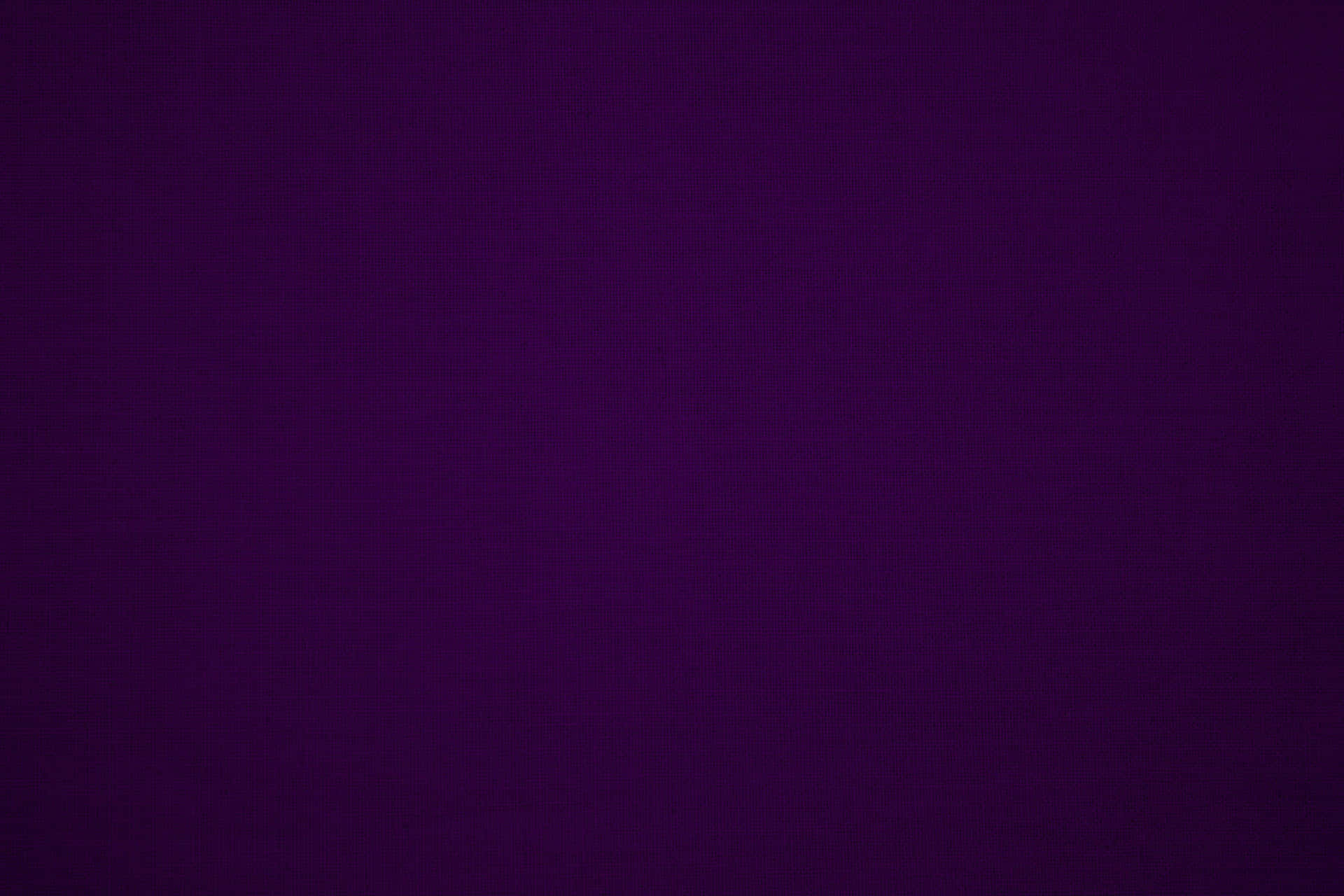 A vibrant solid purple background Wallpaper