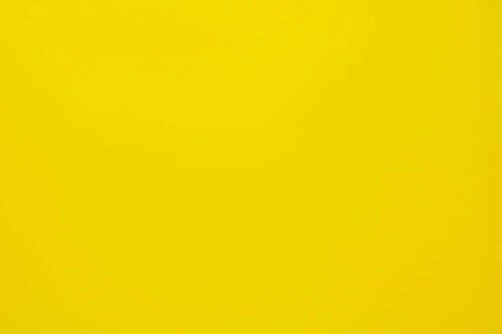 Bright Yellow Background Wallpaper