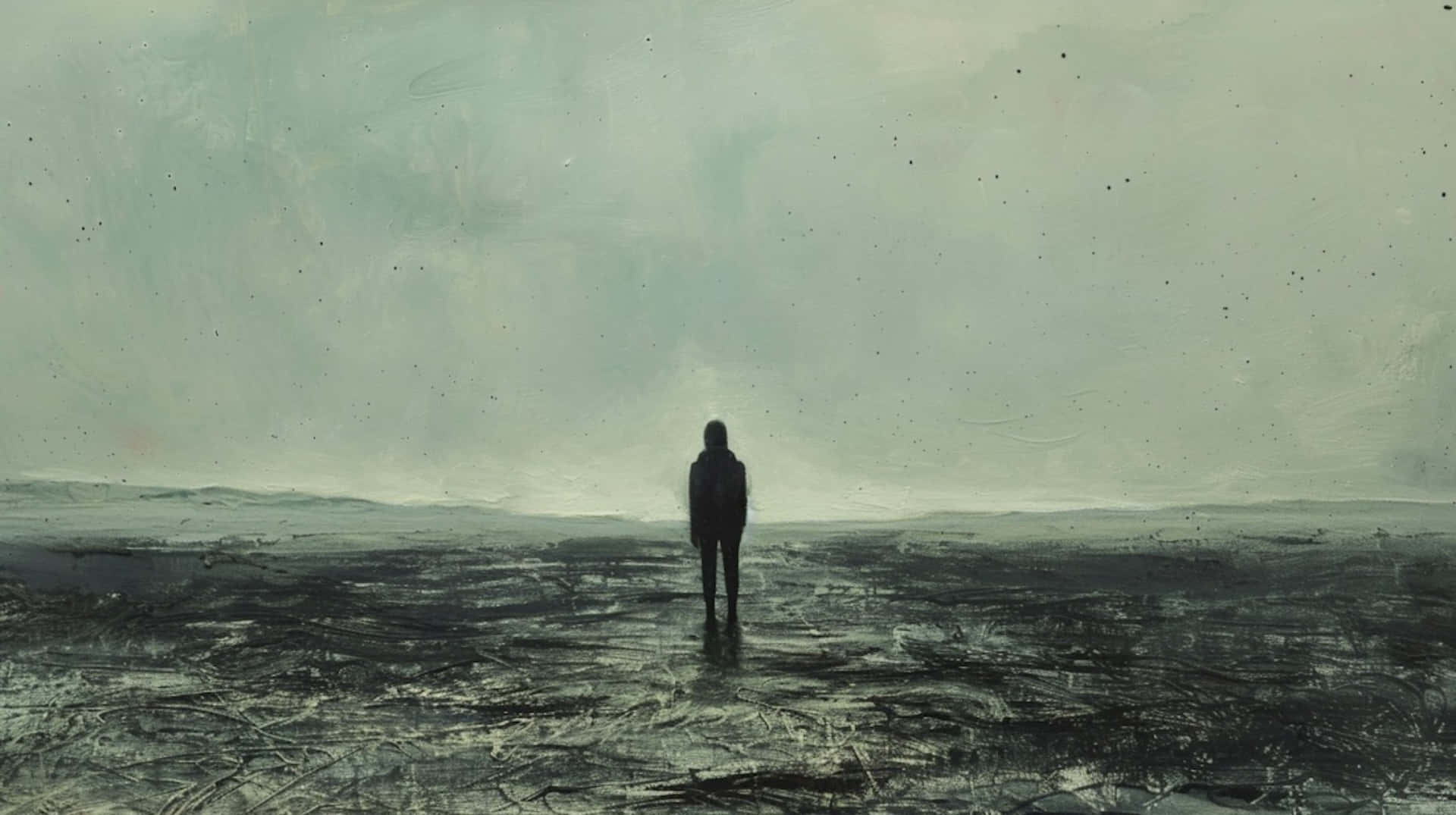 Solitary_ Figure_ In_ Desolate_ Landscape.jpg Wallpaper