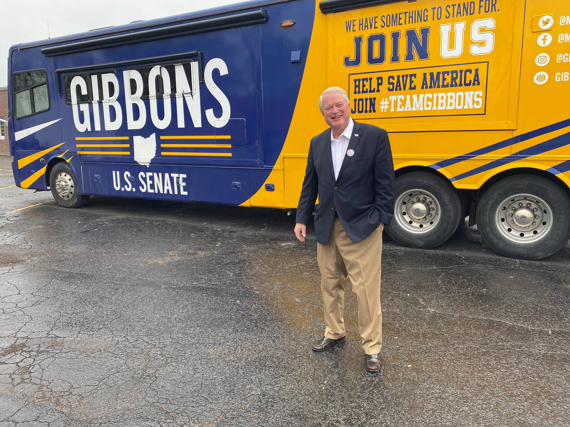 Solo Picture Of Mike Gibbons With Bus Background